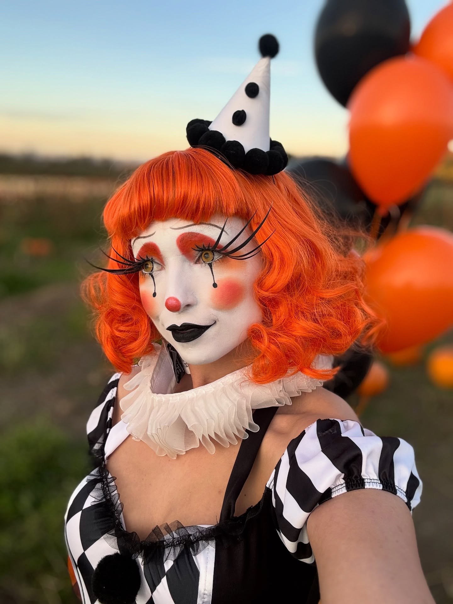 25 Wild Clown Hairstyles for 2026 You Need to See 20 Vibrant Orange Bob With Classic Clown Curls