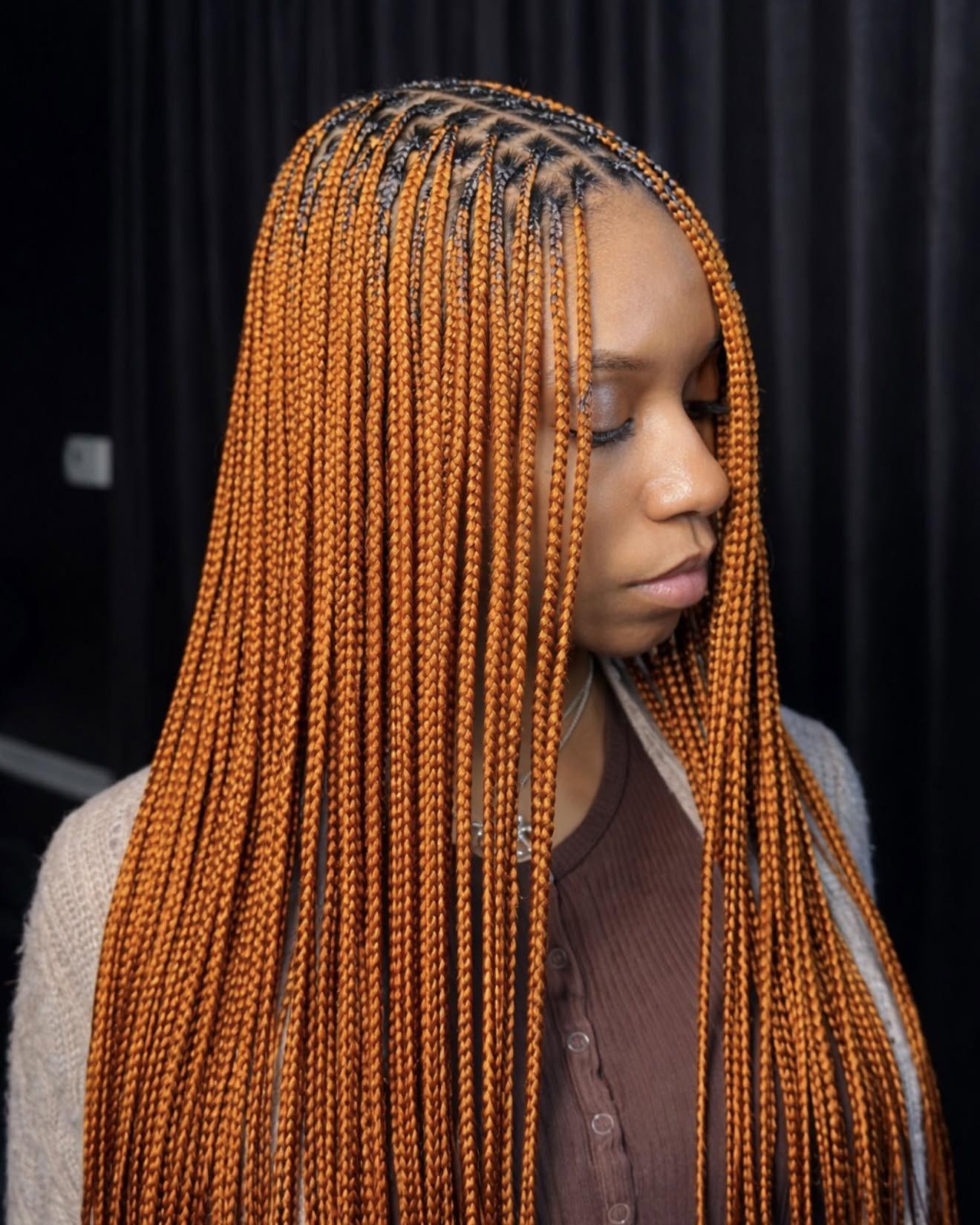 25 Protective Styles for Natural Hair Trends 2026 19 Vibrant Orange Braids With Dark Roots