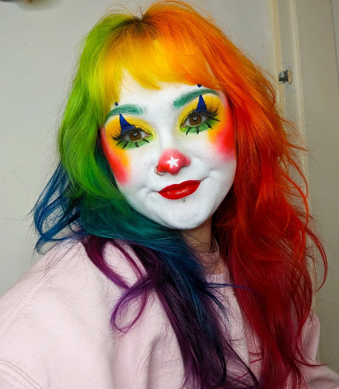25 Wild Clown Hairstyles for 2026 You Need to See 5 Vibrant Rainbow Prism Hair With Loose Waves