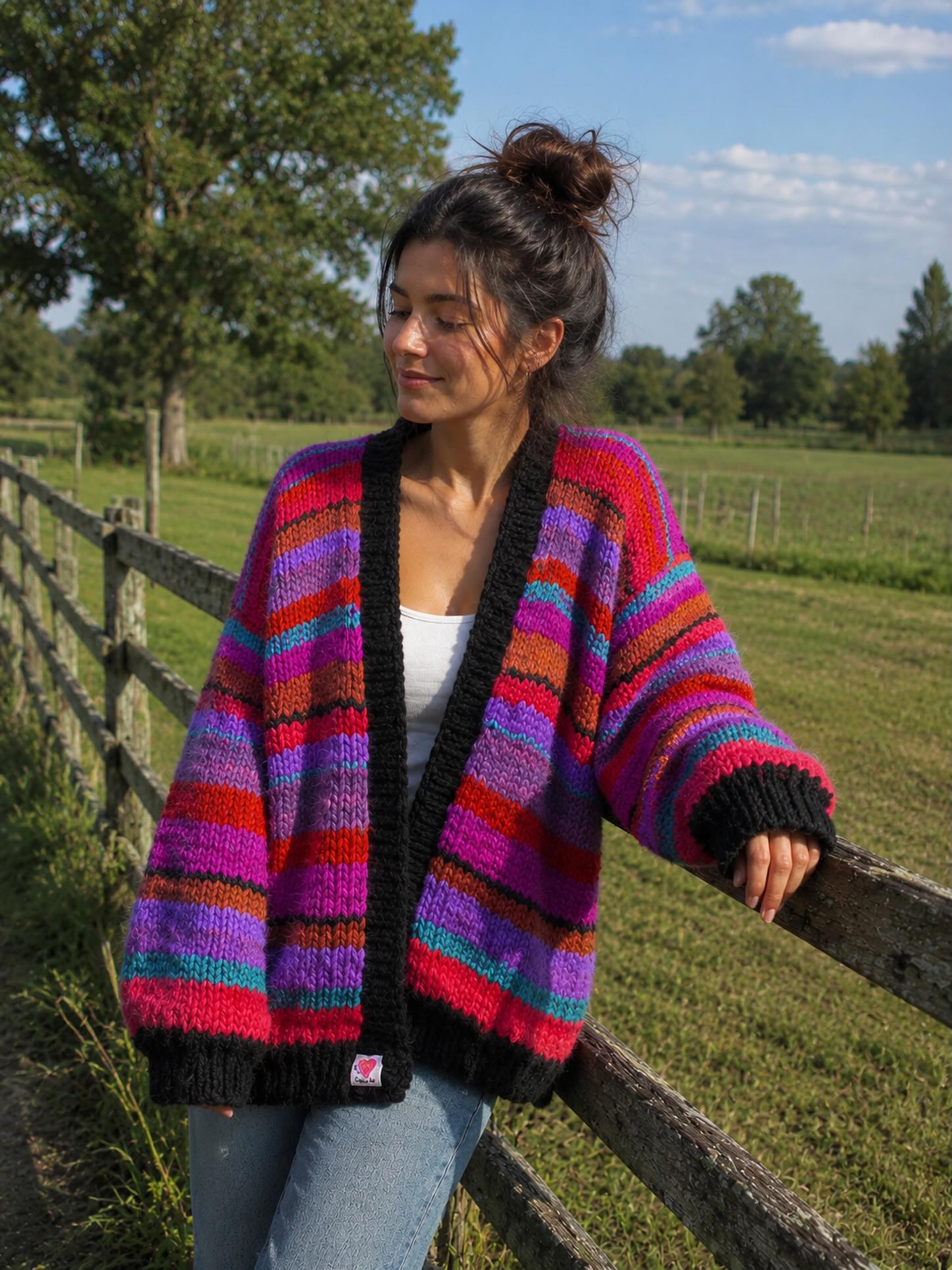 27 Cardigan Outfit Ideas You Need for 2026 18 Vibrant Striped Chunky Knit Cardigan With Denim