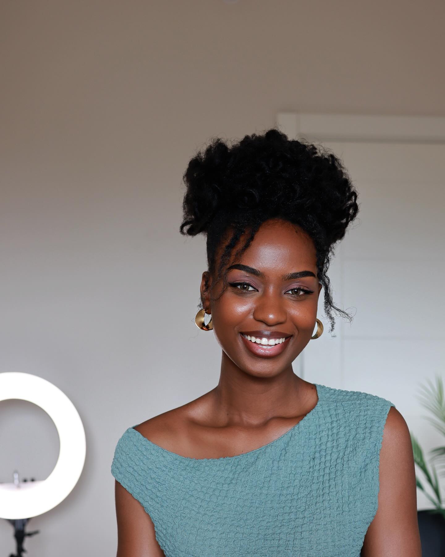 Voluminous High Puff With Defined Curls
