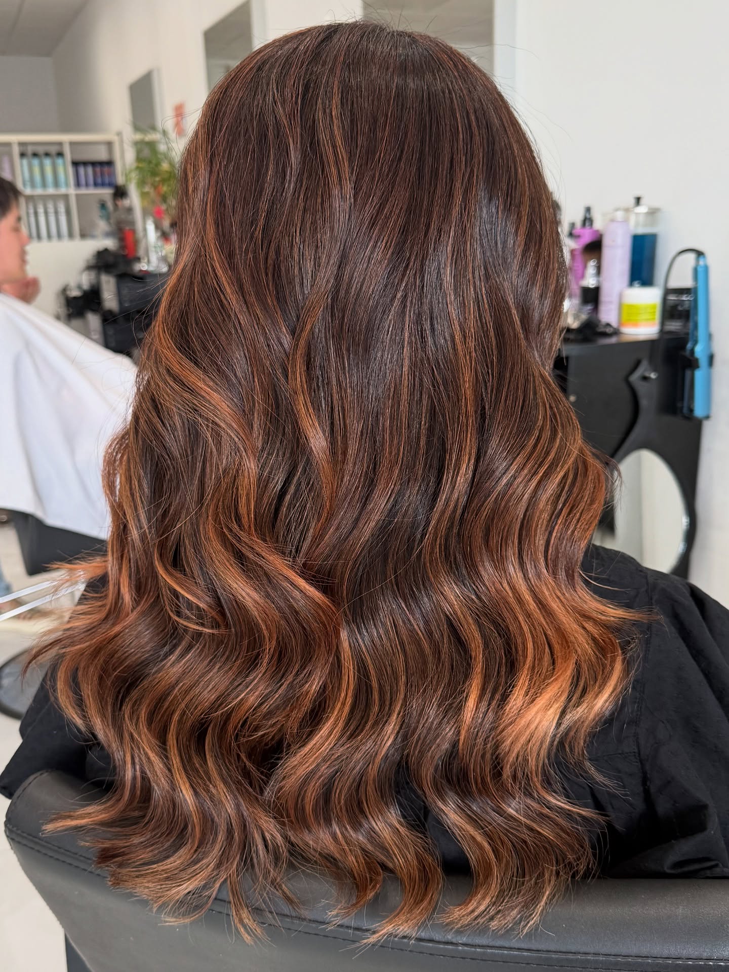 25 Stunning Fall Hair Colors for Brown Hair in 2026 3 Warm Auburn Balayage On Long Wavy Brunette