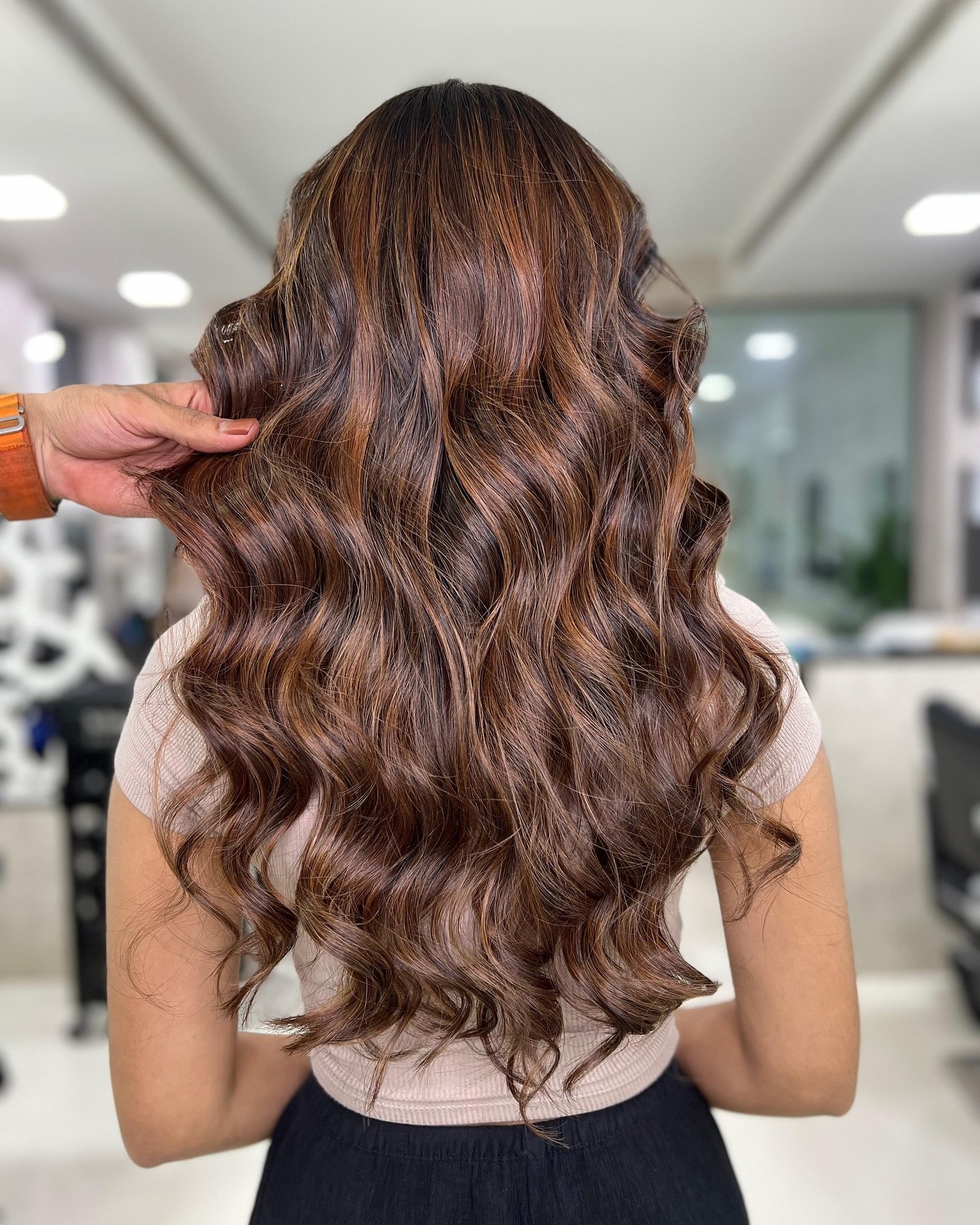25 Stunning Fall Hair Colors for Brown Hair in 2026 21 Warm Auburn Highlights On Long Wavy Brunette