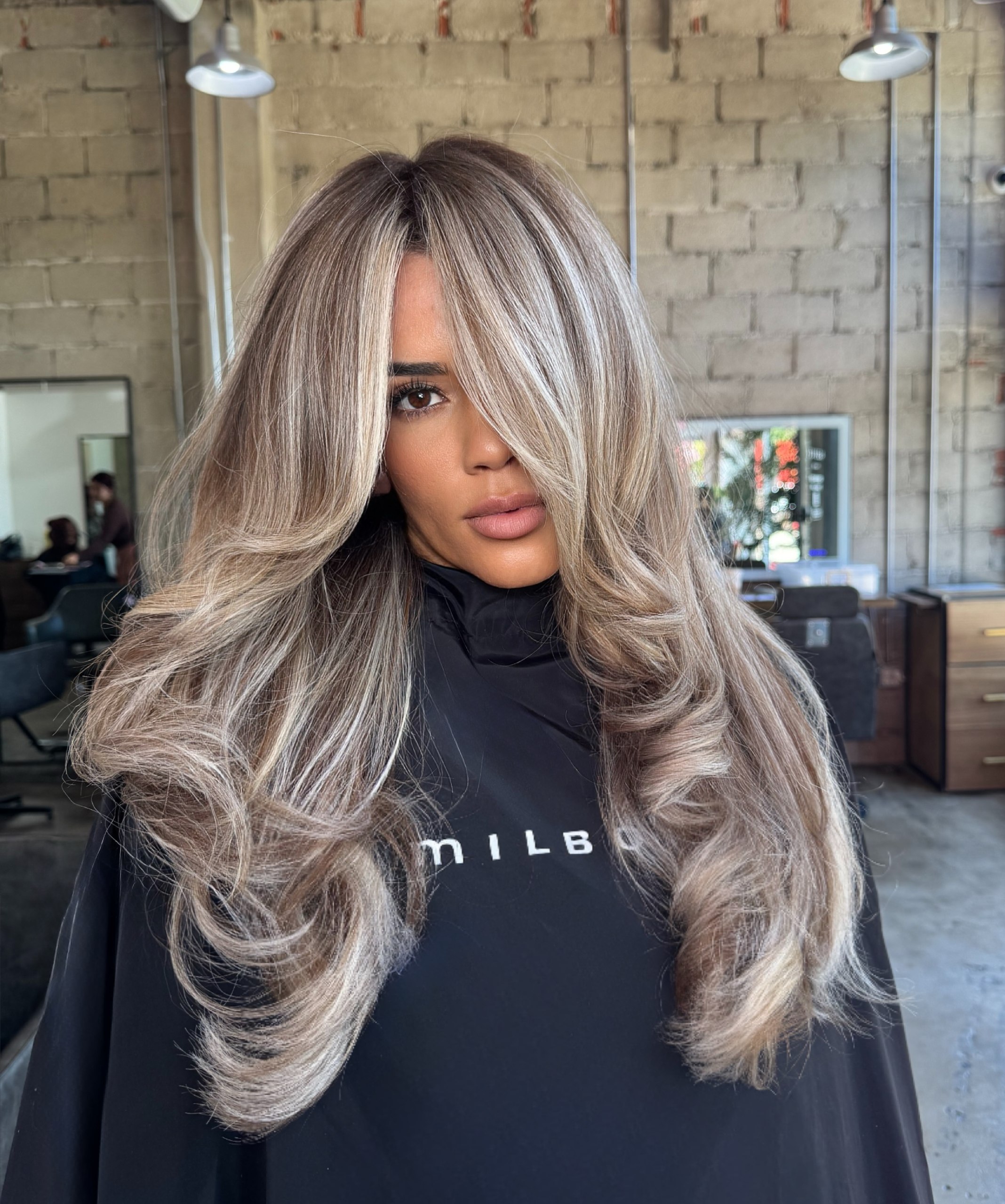 27 Stunning Fall Hair Colors for Brunettes 2026 28 Warm Bronde Balayage With Loose Hollywood Waves