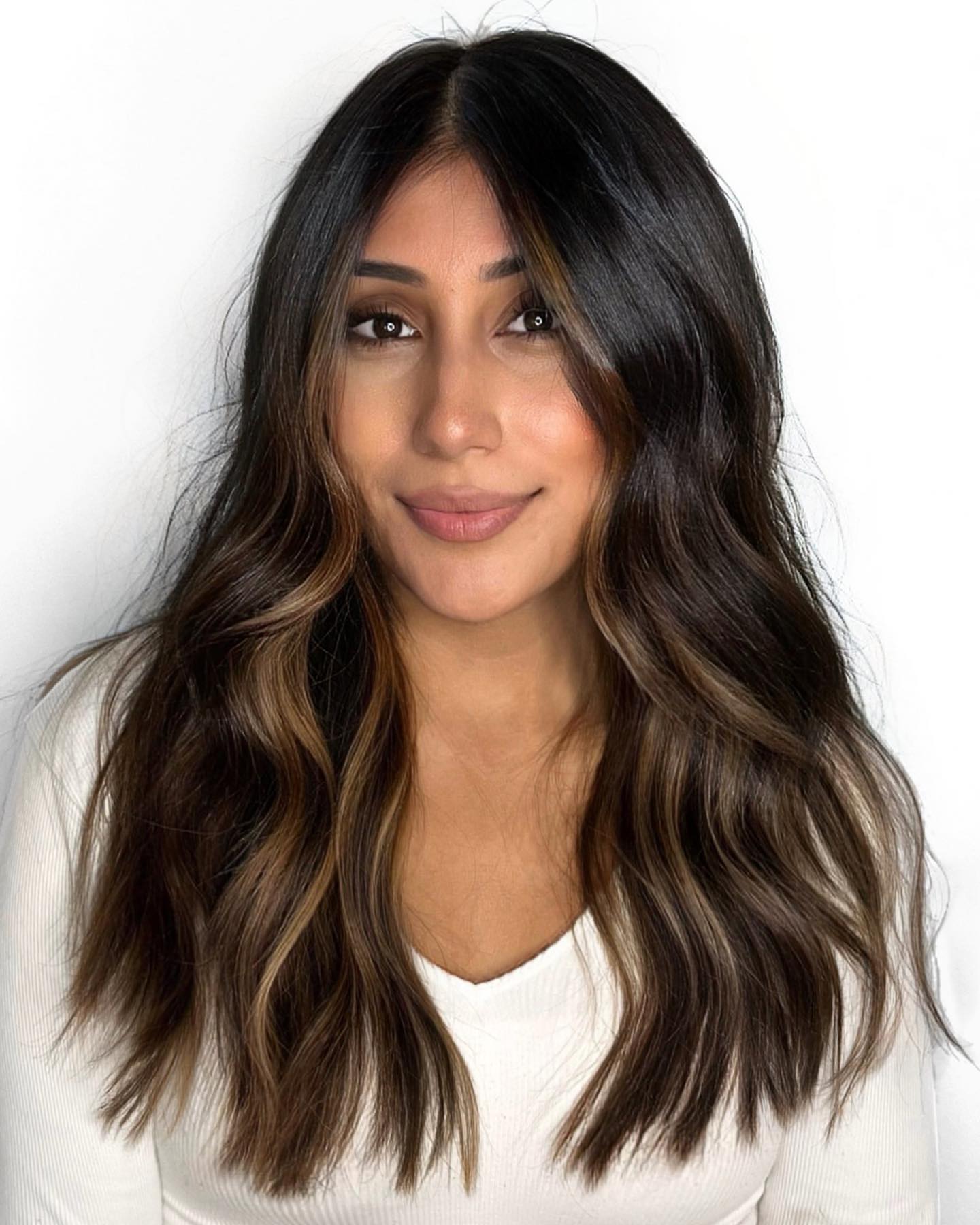27 Fall Hair Colors 2026 You Need To See Now 23 Warm Caramel Balayage On Dark Wavy Hair