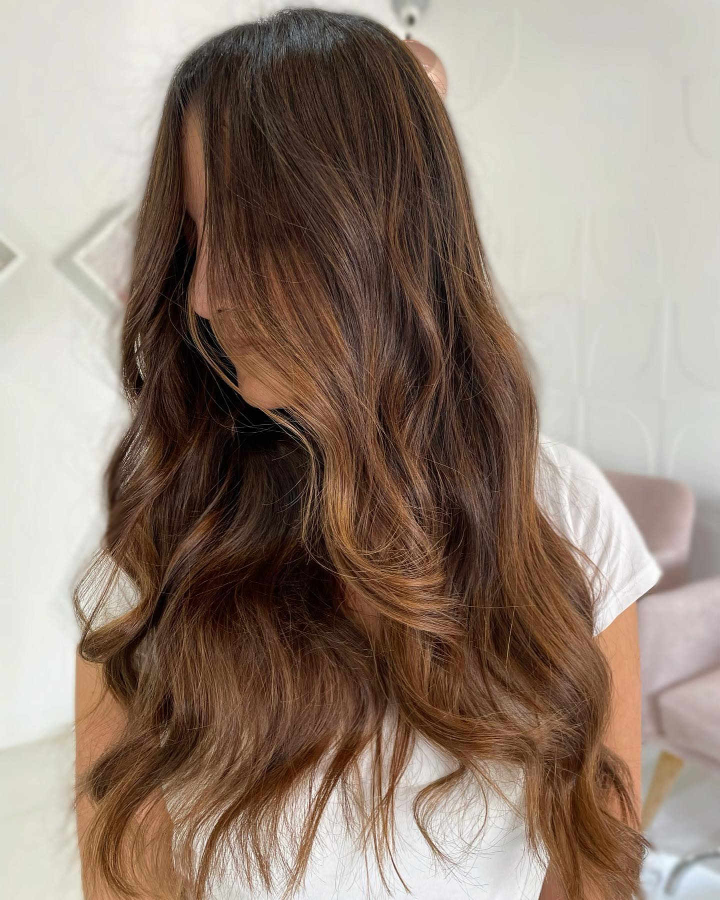 25 Stunning Brown Cinnamon Hair Color Ideas for 2026 22 Warm Cinnamon Balayage With Loose Waves