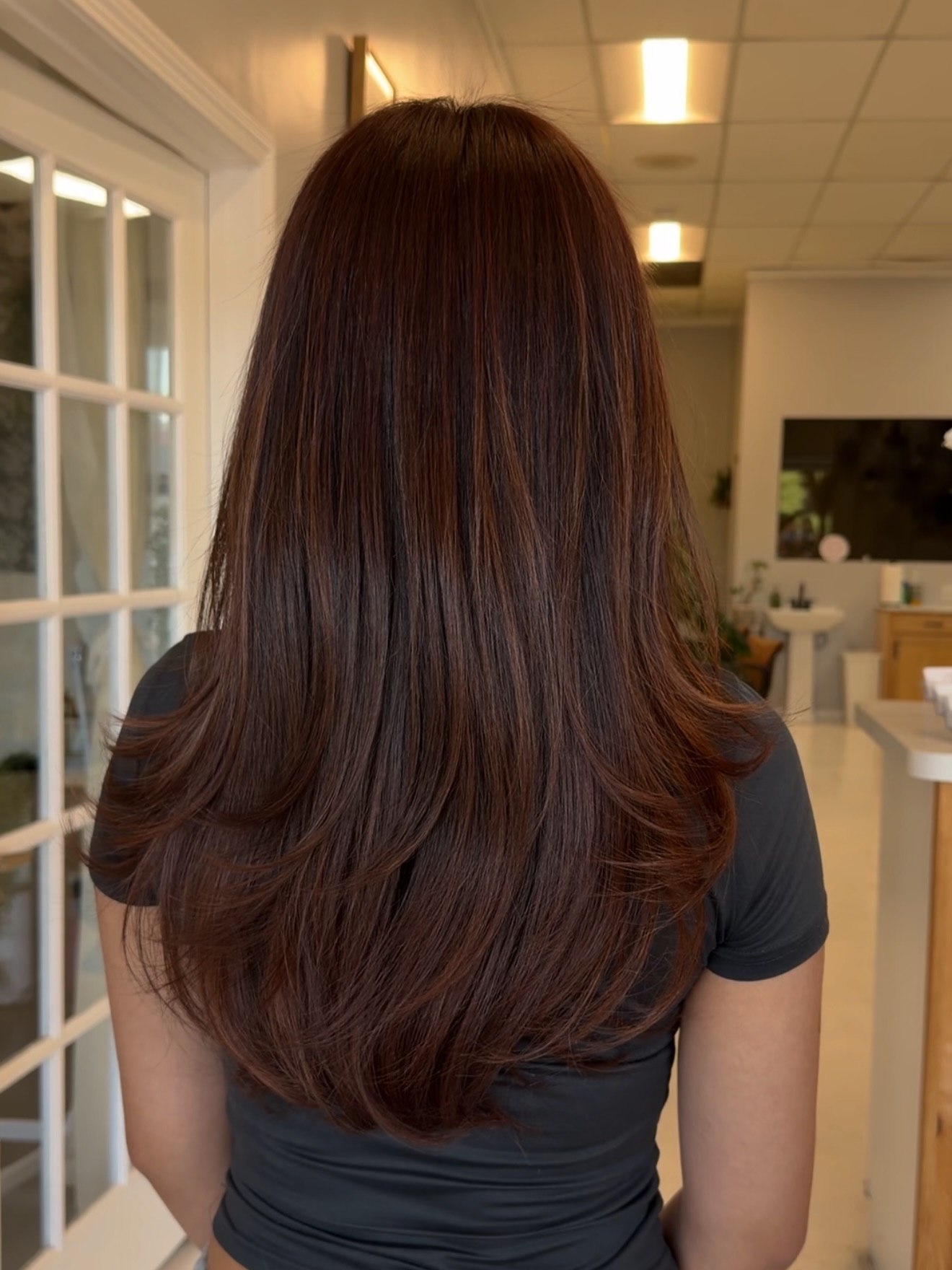25 Stunning Brown Cinnamon Hair Color Ideas for 2026 12 Warm Cinnamon Toned Layers With Subtle Shine