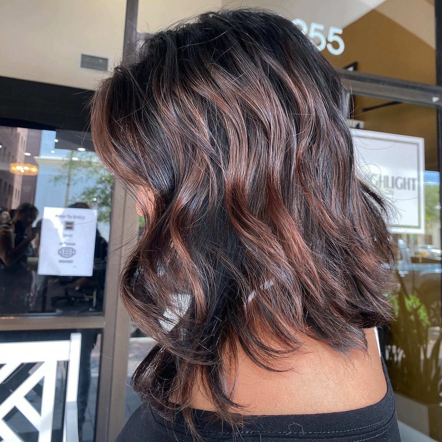 25 Stunning Fall Hair Colors for Brown Hair in 2026 6 Warm Copper Highlights On Dark Wavy Lob
