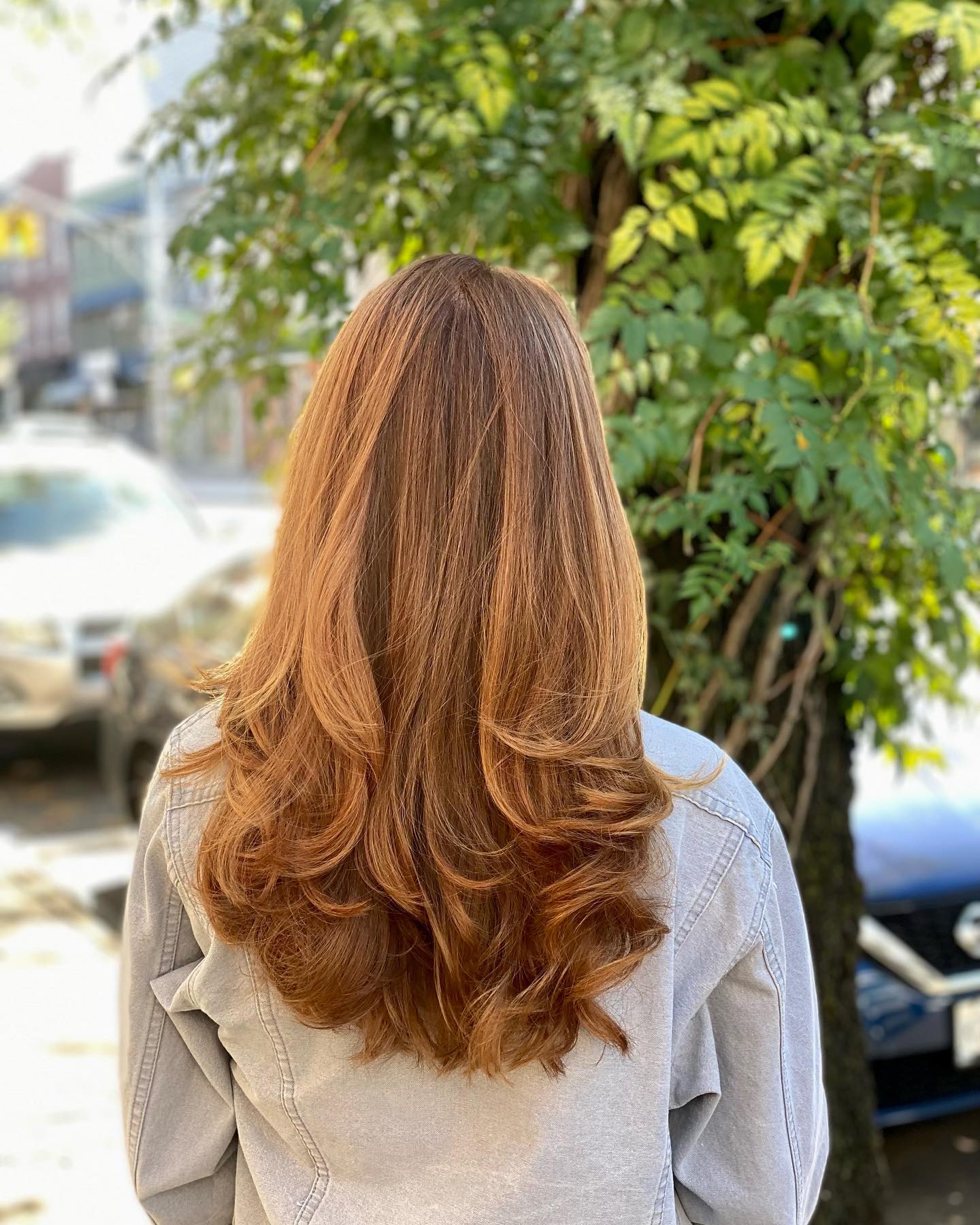 25 Fall Haircuts 2026 You Need To See Now 21 Warm Copper Layers With Voluminous Face-Framing Curls