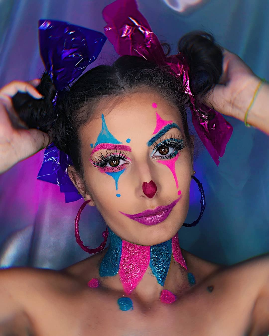 25 Wild Clown Hairstyles for 2026 You Need to See 13 Whimsical Clown Pigtails With Metallic Bows