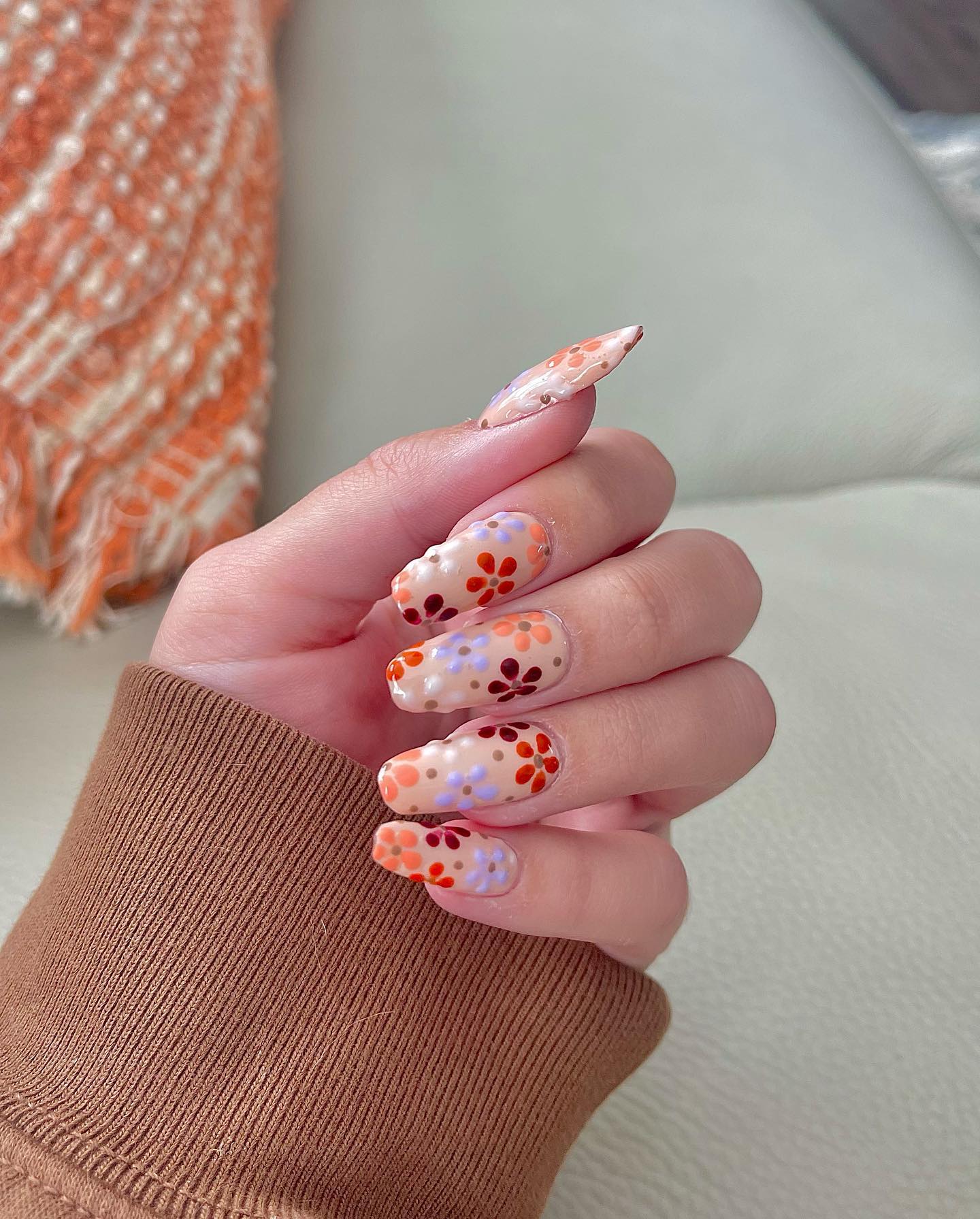 25 Fall Nail Ideas You Need to Try in 2026 24 Whimsical Floral Accent Coffin Nails