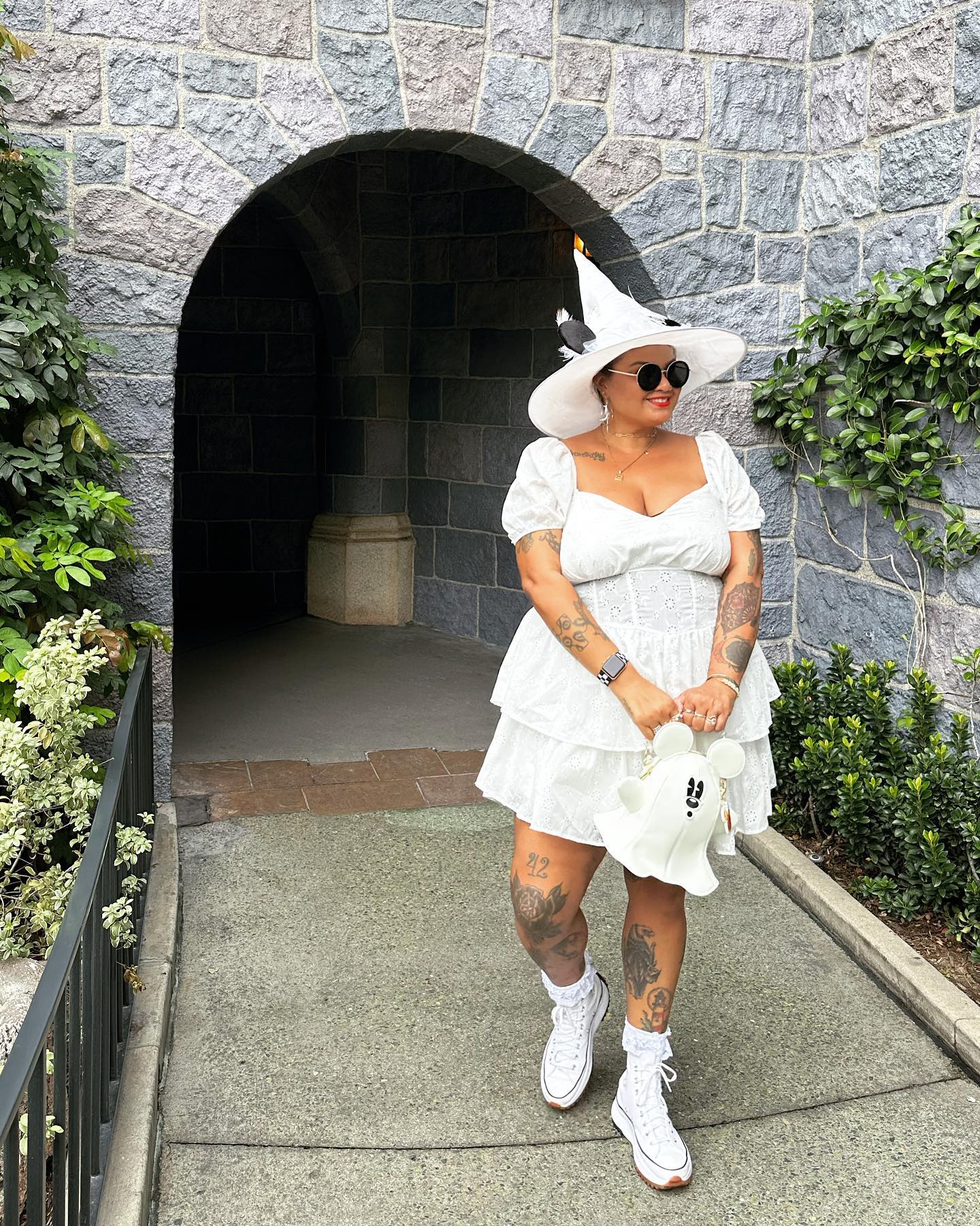 25 Witchy Outfit Ideas for 2026 24 Whimsical White Witchy Costume With Ghost Bag