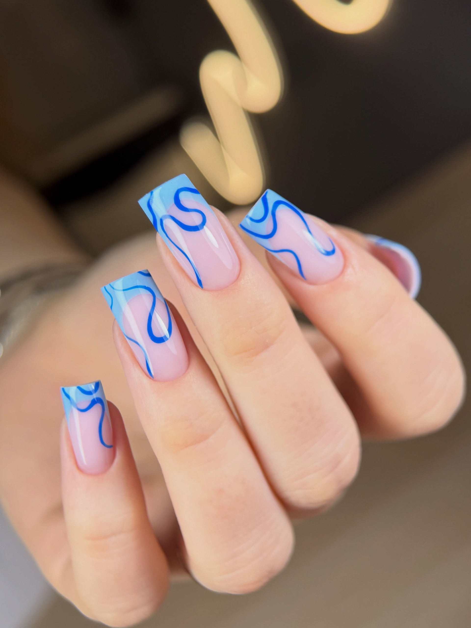 Abstract Blue Swirl French Tip Nails