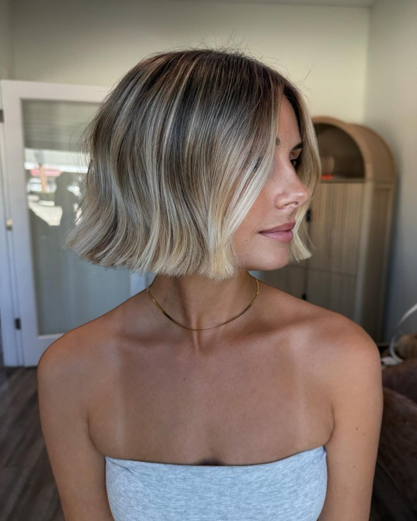 Blonde Bob With Subtle Waves And Face-Framing Layers
