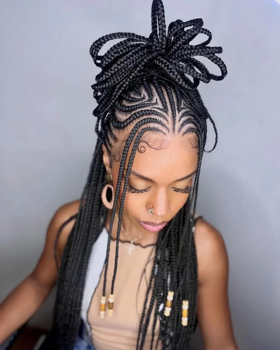 Braided High Bun With Laid Edges And Beads