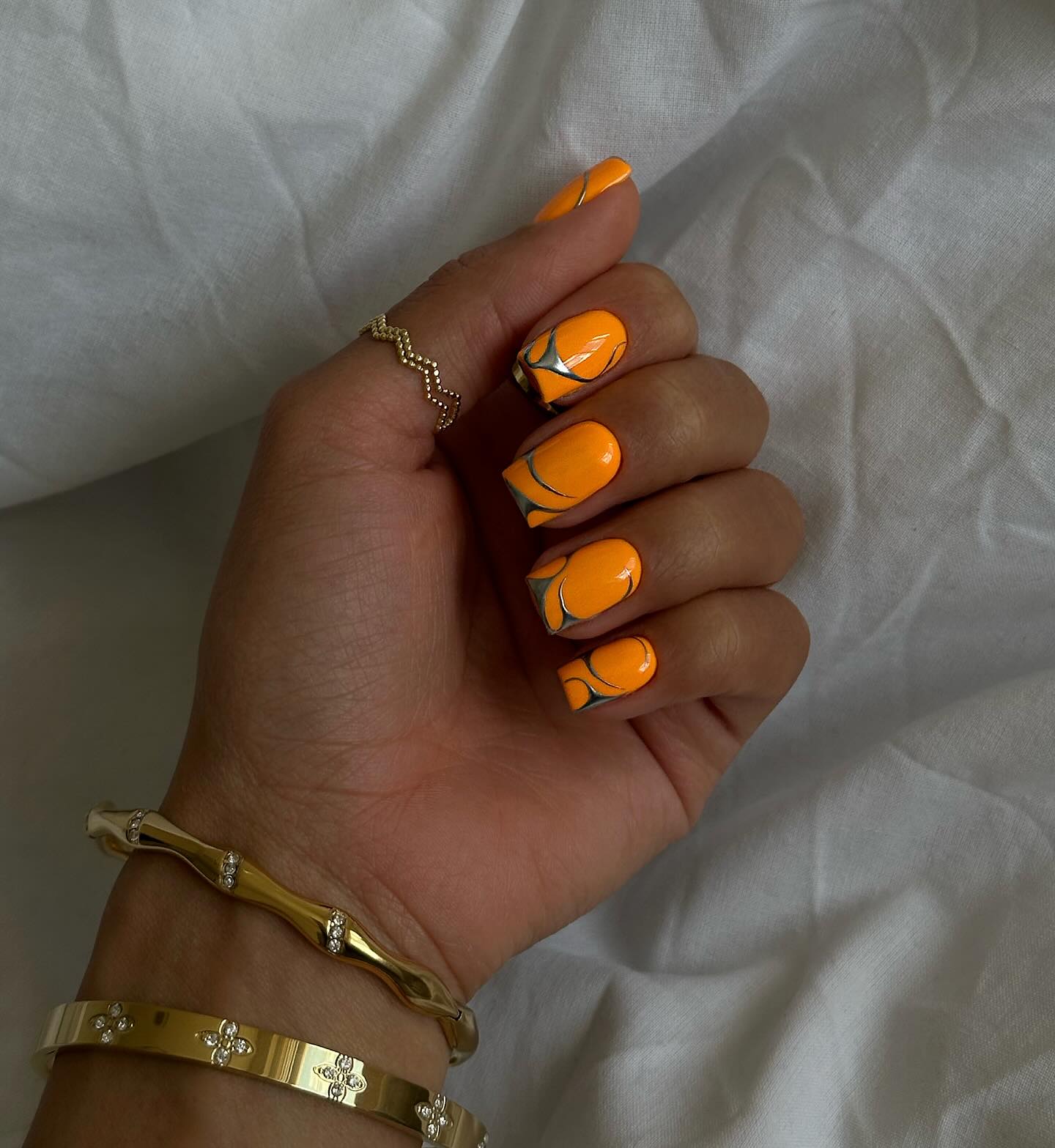 Bright Orange Swirl French Tip Nails