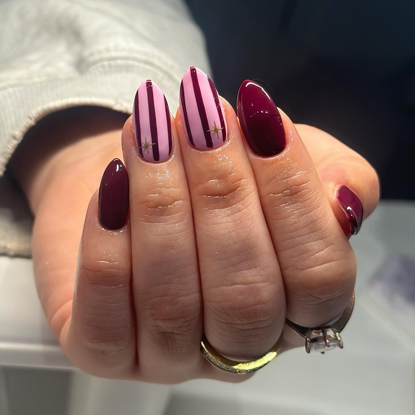 Burgundy and Pink Striped Oval Nails