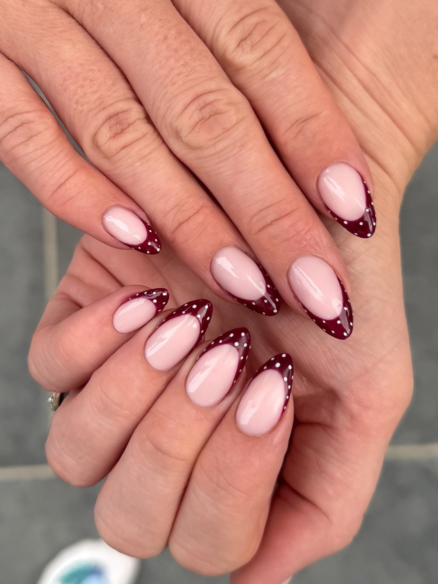 Burgundy Polka Dot French Tip Almond Nails