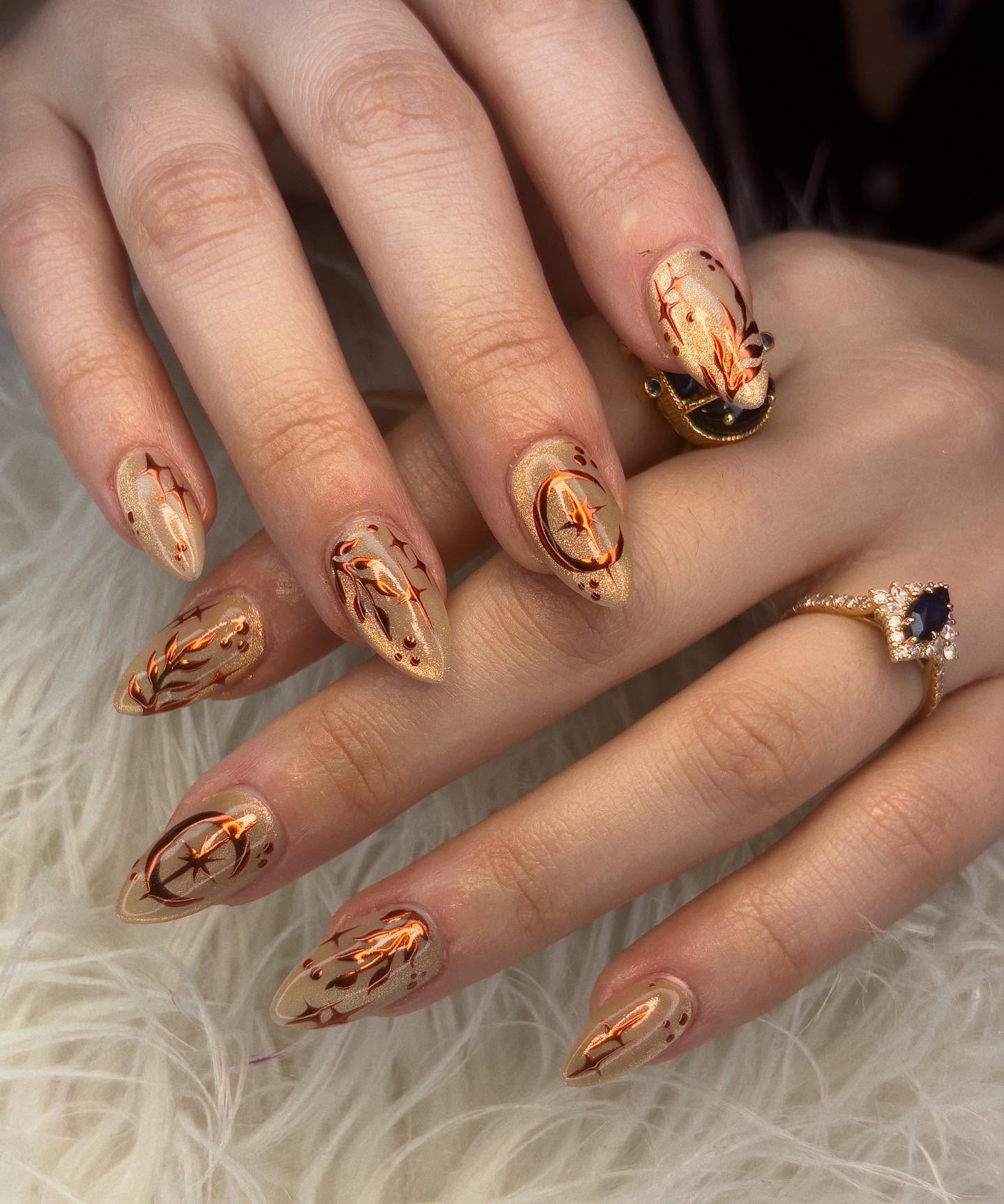 Celestial Rose Gold Stiletto Nails