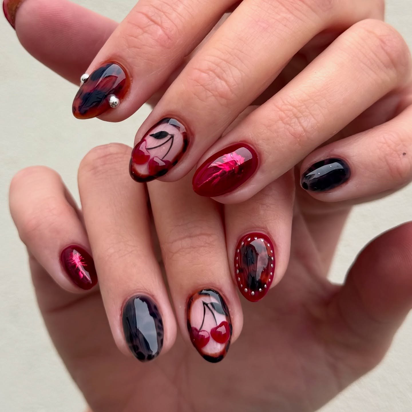 Cherry Detail Tortoiseshell Almond Nails