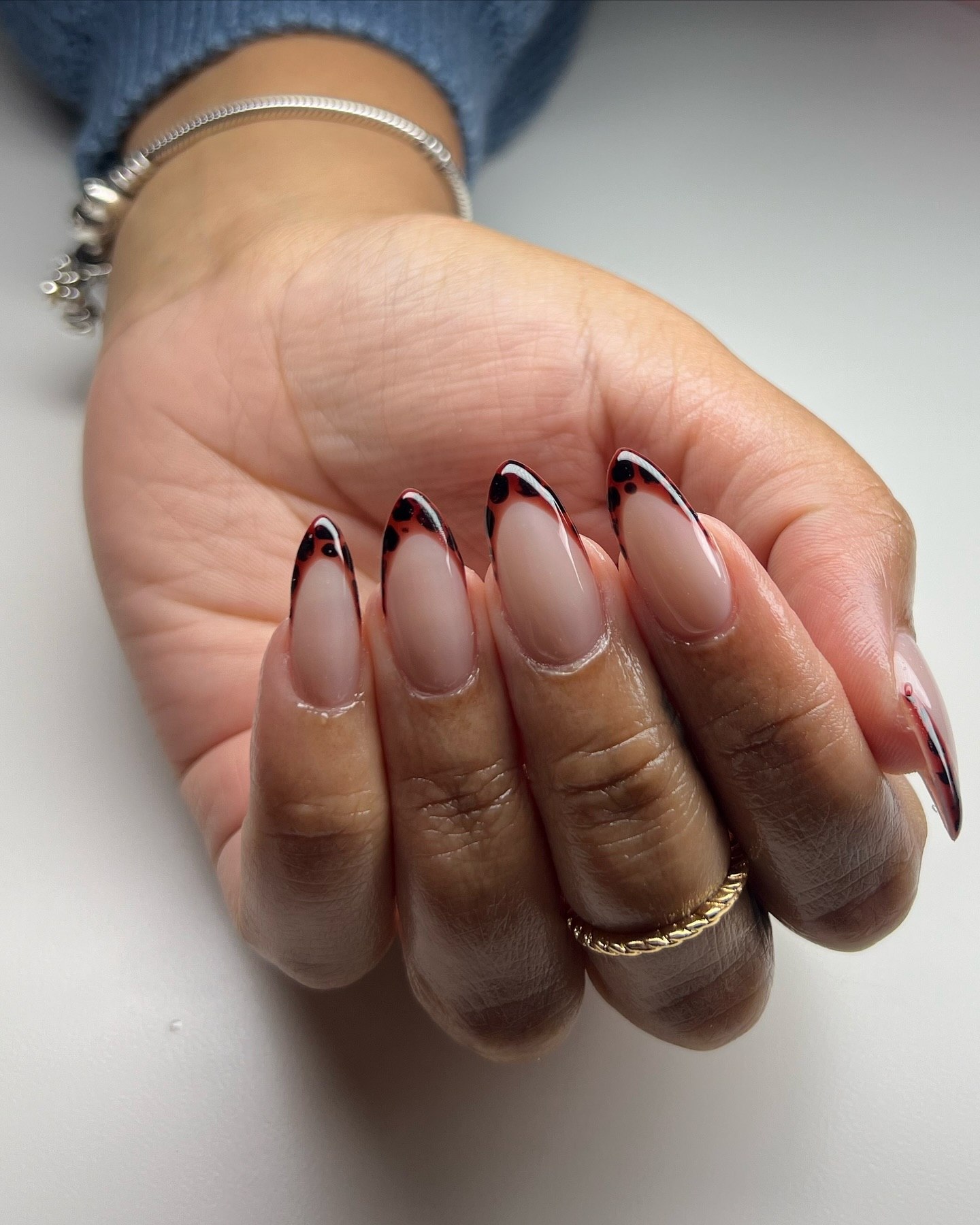 Chic Leopard Print French Tip Almond Nails