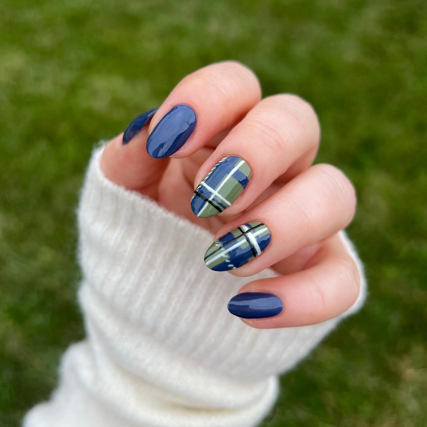 Chic Plaid Nail Art with Deep Blue Accents