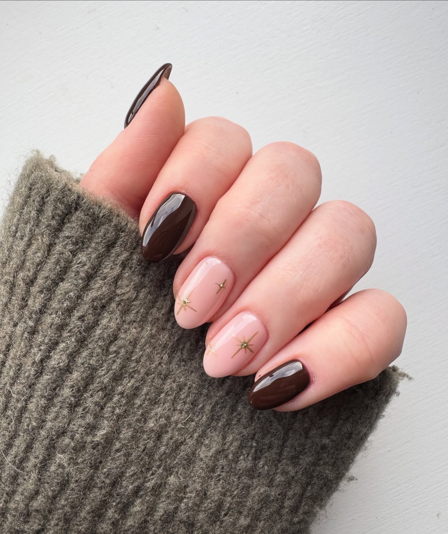 Chocolate Brown & Star Accented Pink Almond Nails