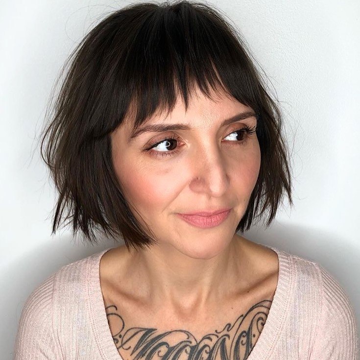 Choppy Brunette Bob With Wispy Bangs