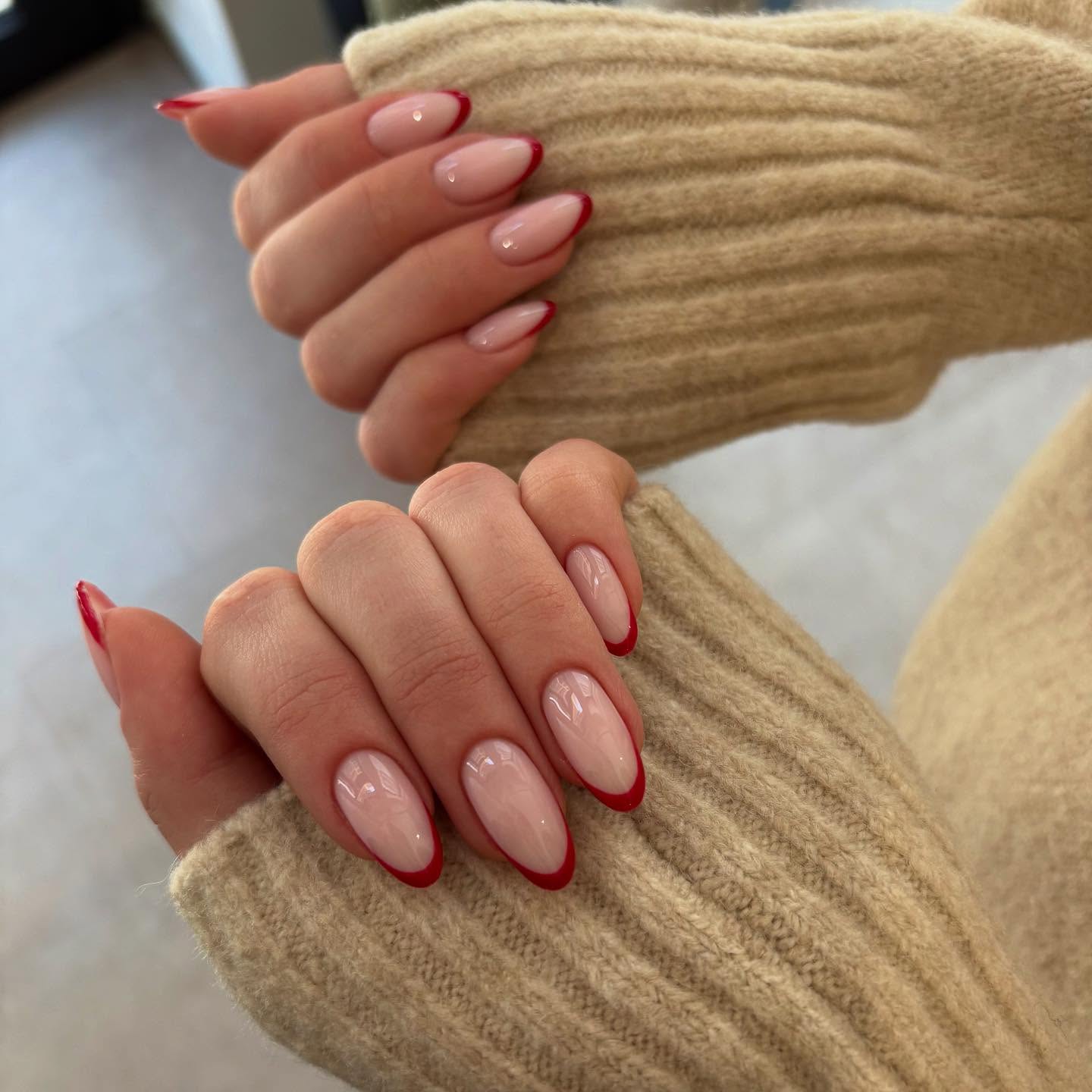 Classic Red French Tip Almond Nails