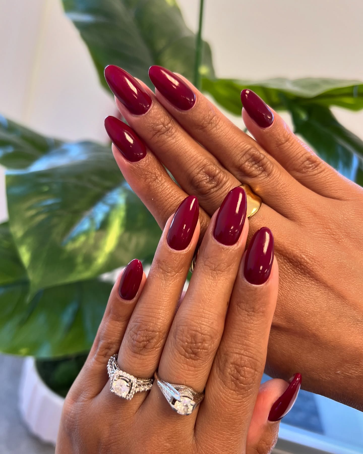 Deep Berry Glossy Almond Nails