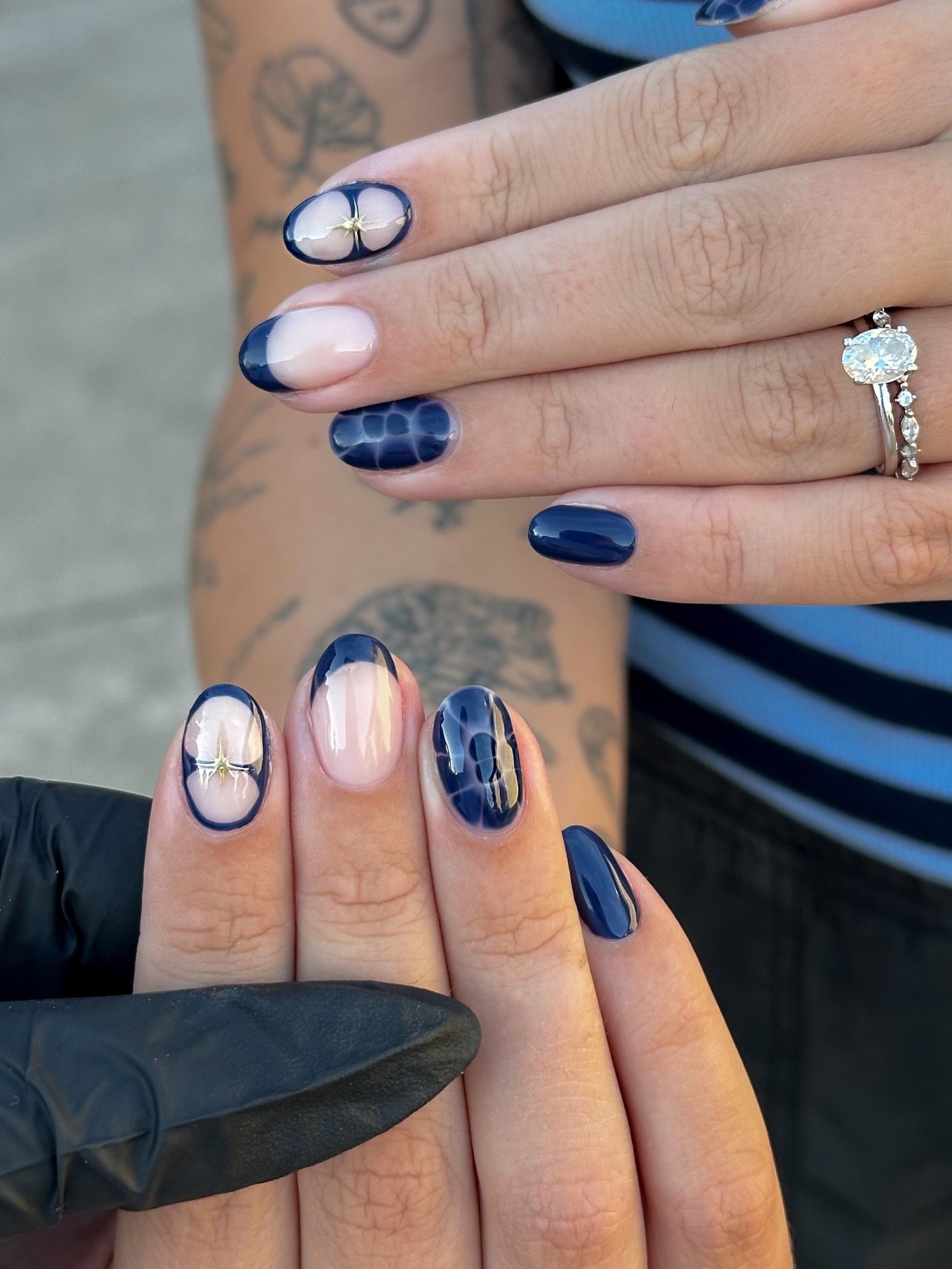 Deep Blue Oval Nails with Gold Star Accent