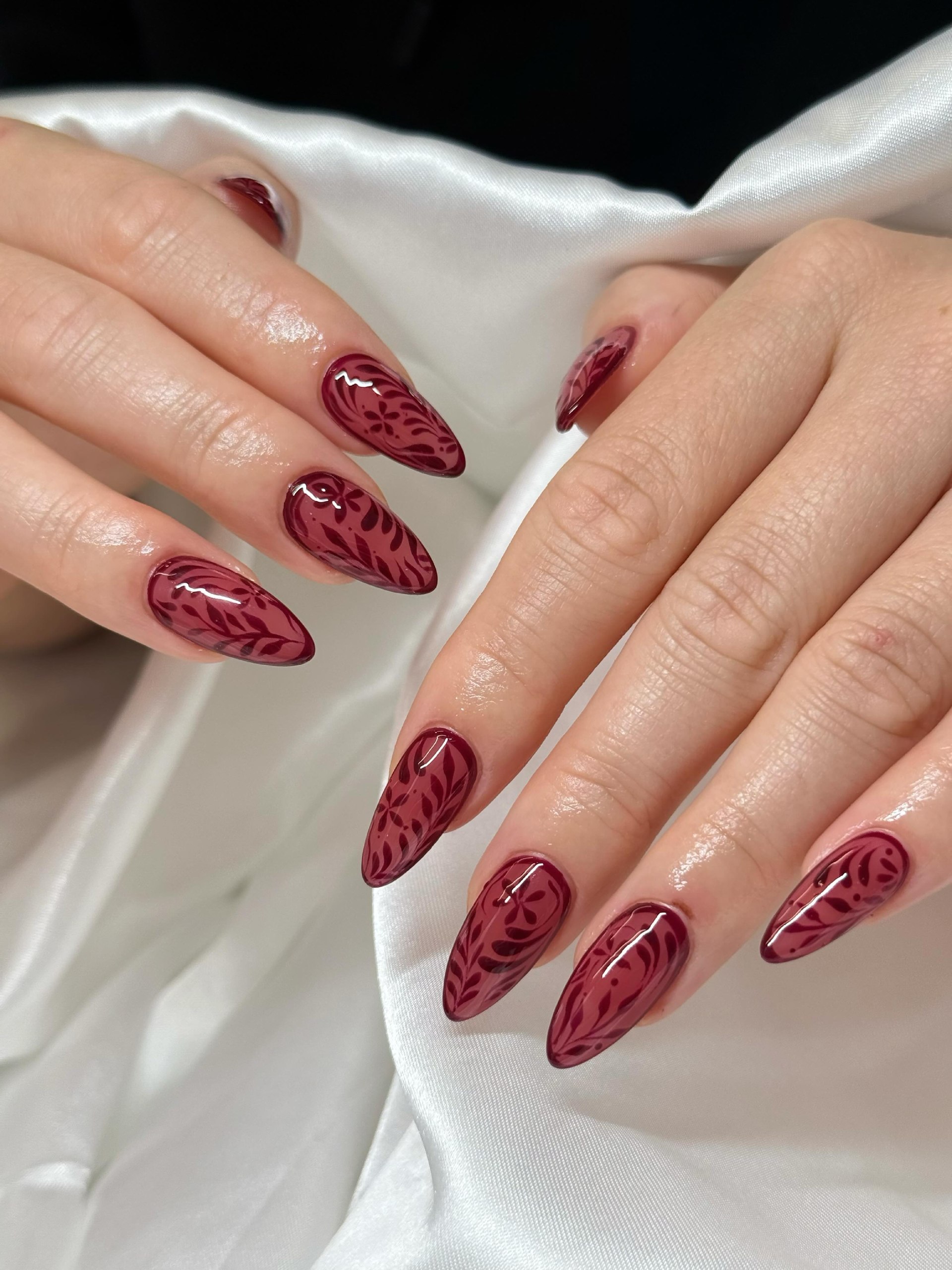 Deep Burgundy Leafy Swirl Almond Nails