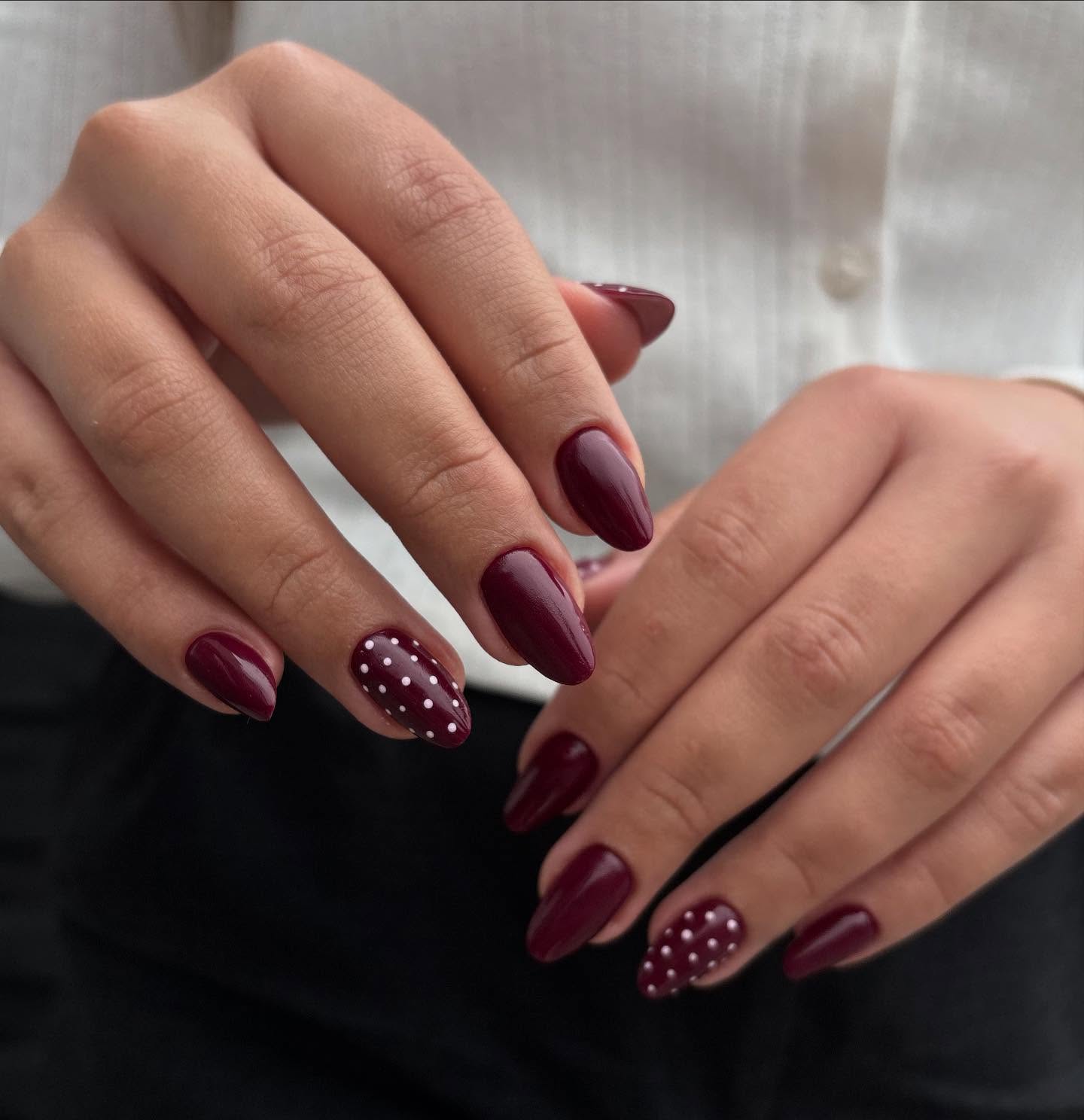 Deep Burgundy Polka Dot Almond Nails