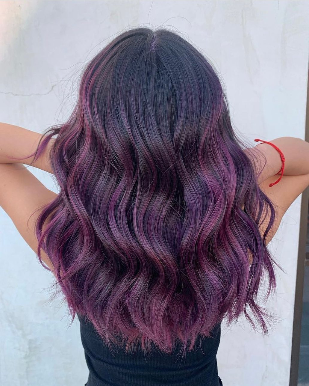 Deep Plum Balayage With Soft Waves