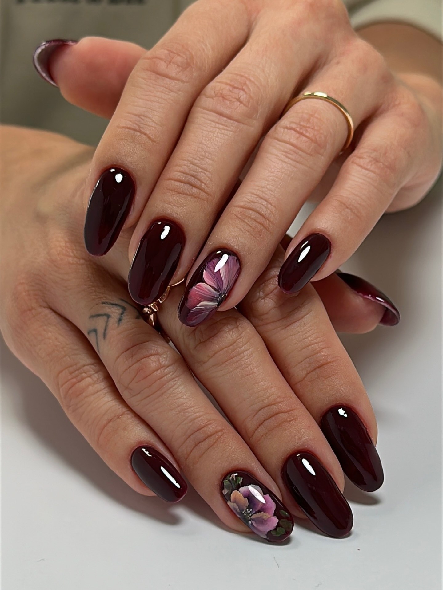 Deep Wine Oval Nails With Floral Art