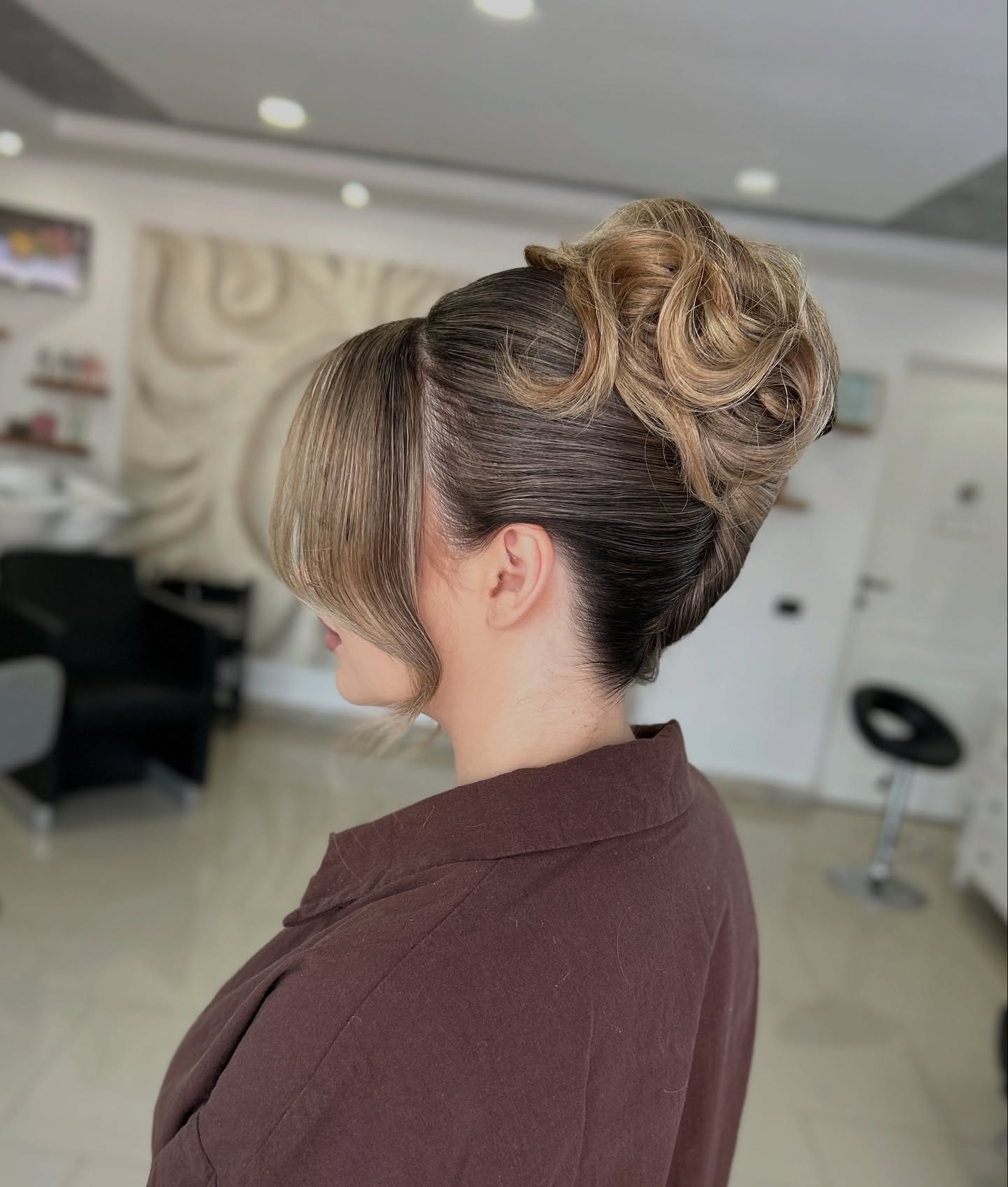 Elegant Chignon With Voluminous Curls