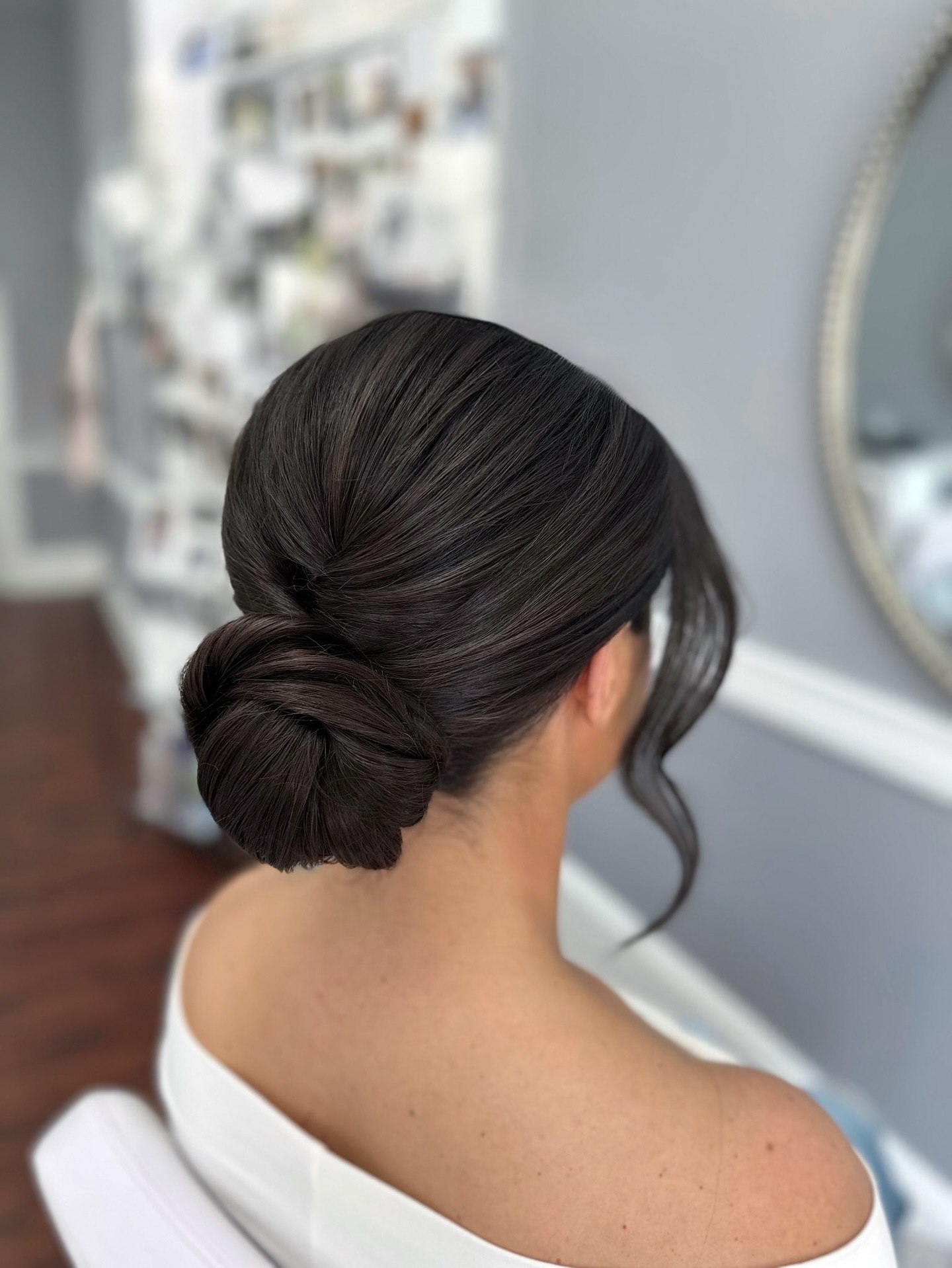Elegant Twisted Low Bun With Wispy Strands