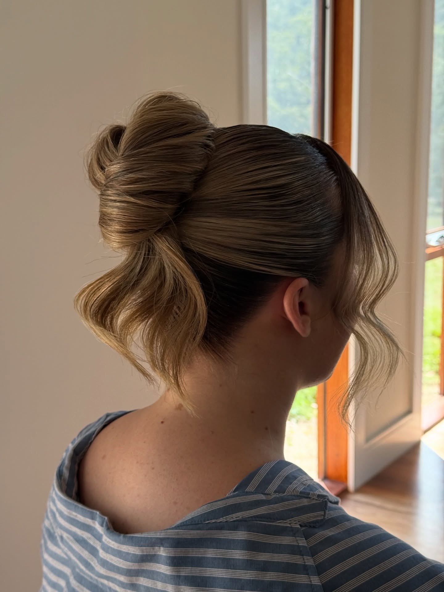Elegant Twisted Updo With Soft Face-Framing Waves
