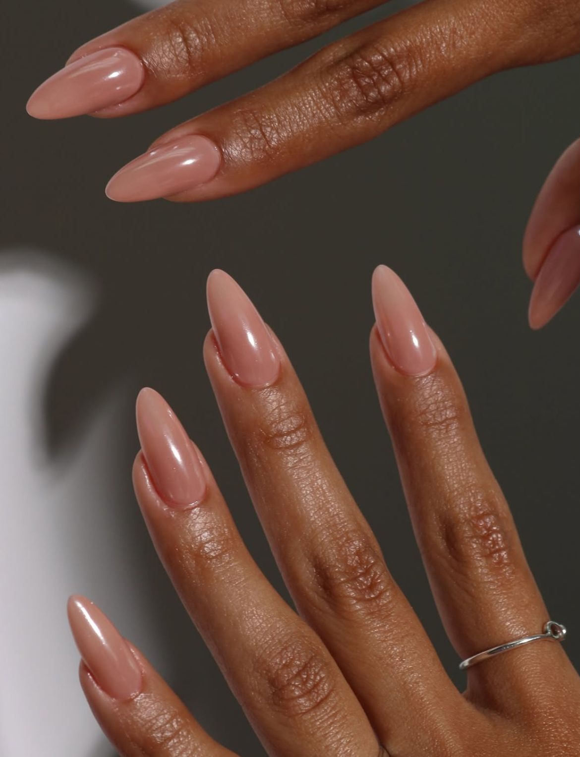 Glossy Almond Nude Nails with Warm Undertones