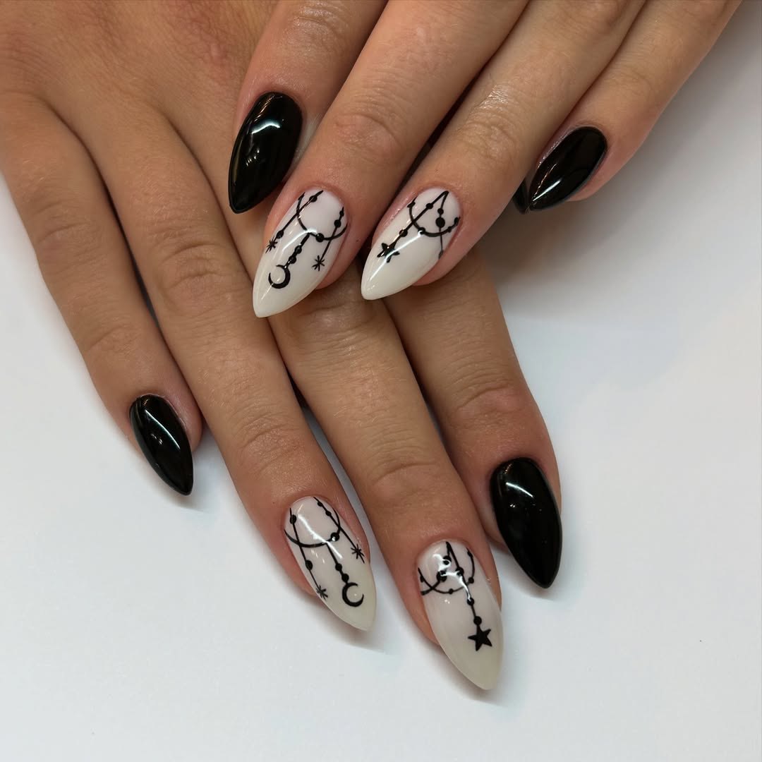 Glossy Black & Celestial Moon Almond Nails