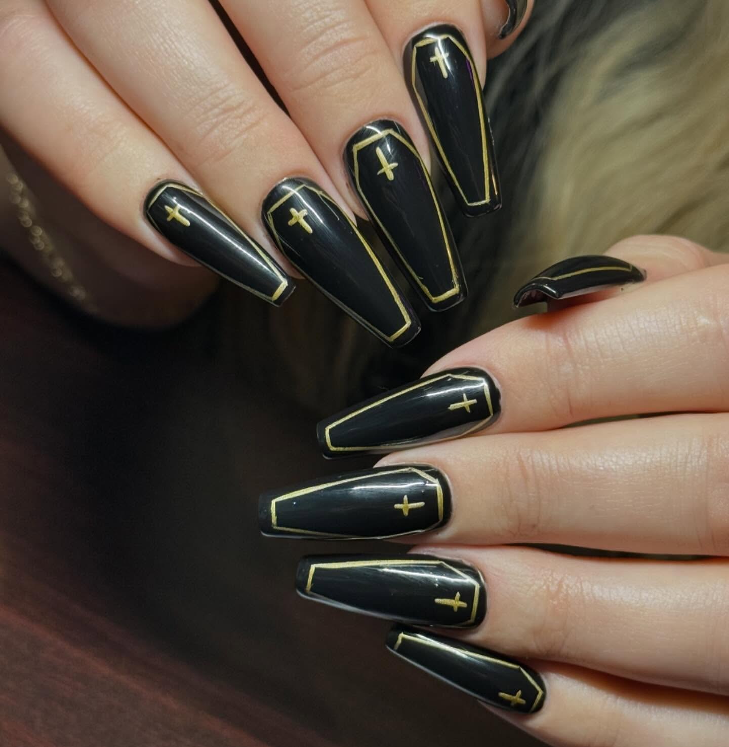 Glossy Black Coffin Nails With Gold Cross Detail