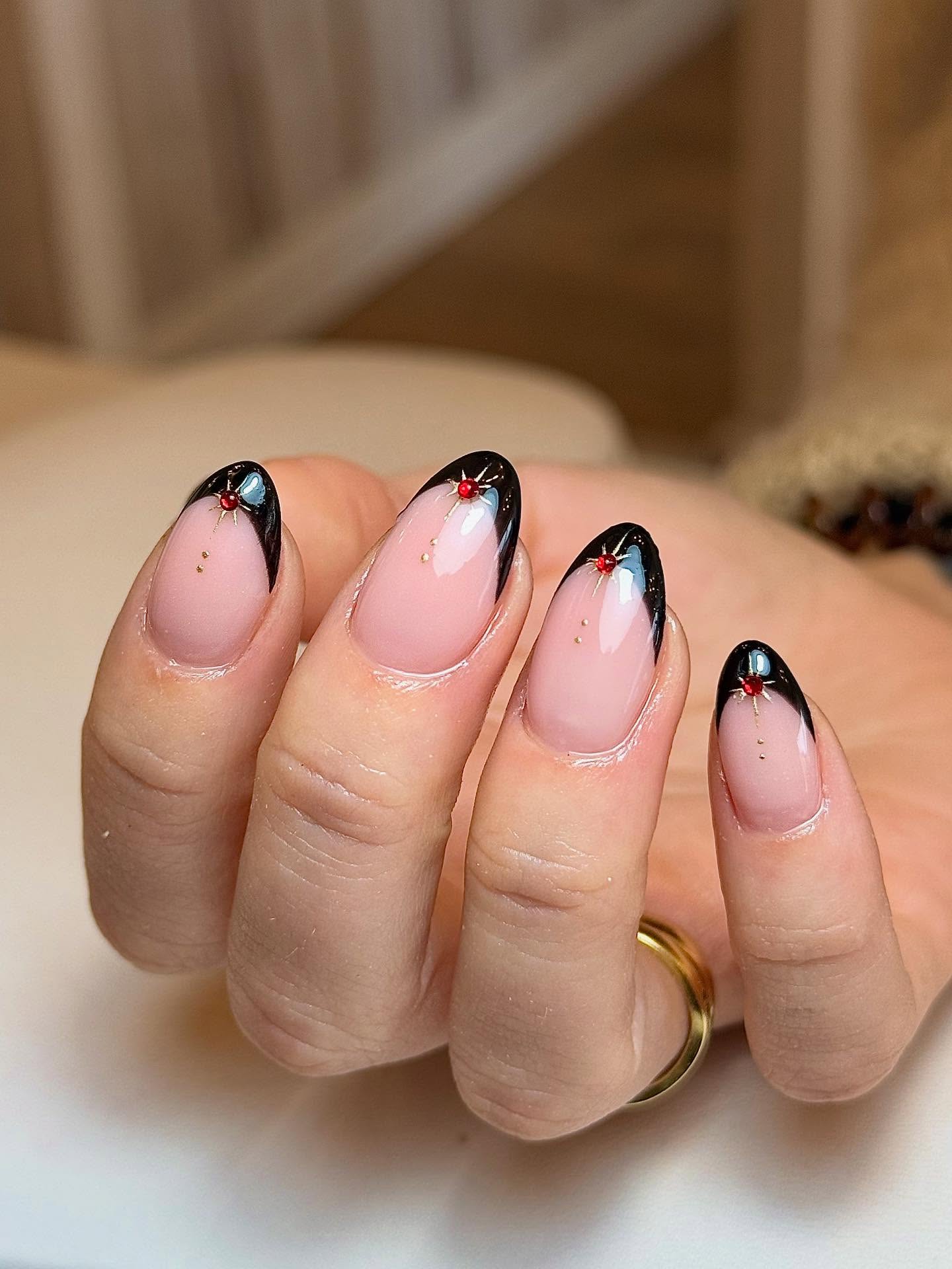 Glossy Black French Tips With Red Gem Accents