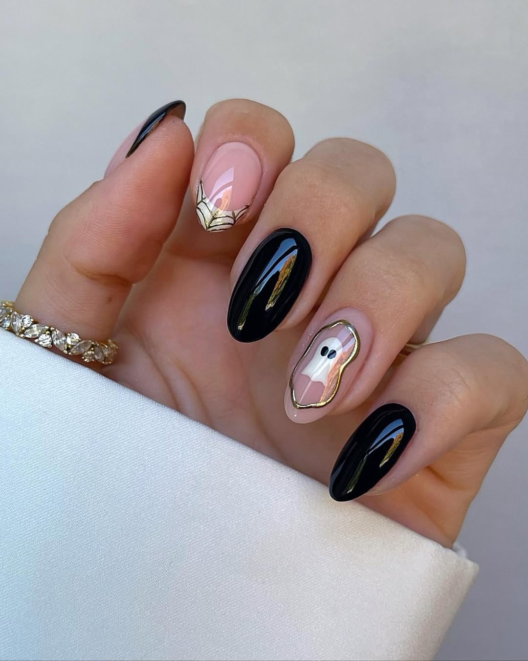 Glossy Black Ghost Halloween Almond Nails