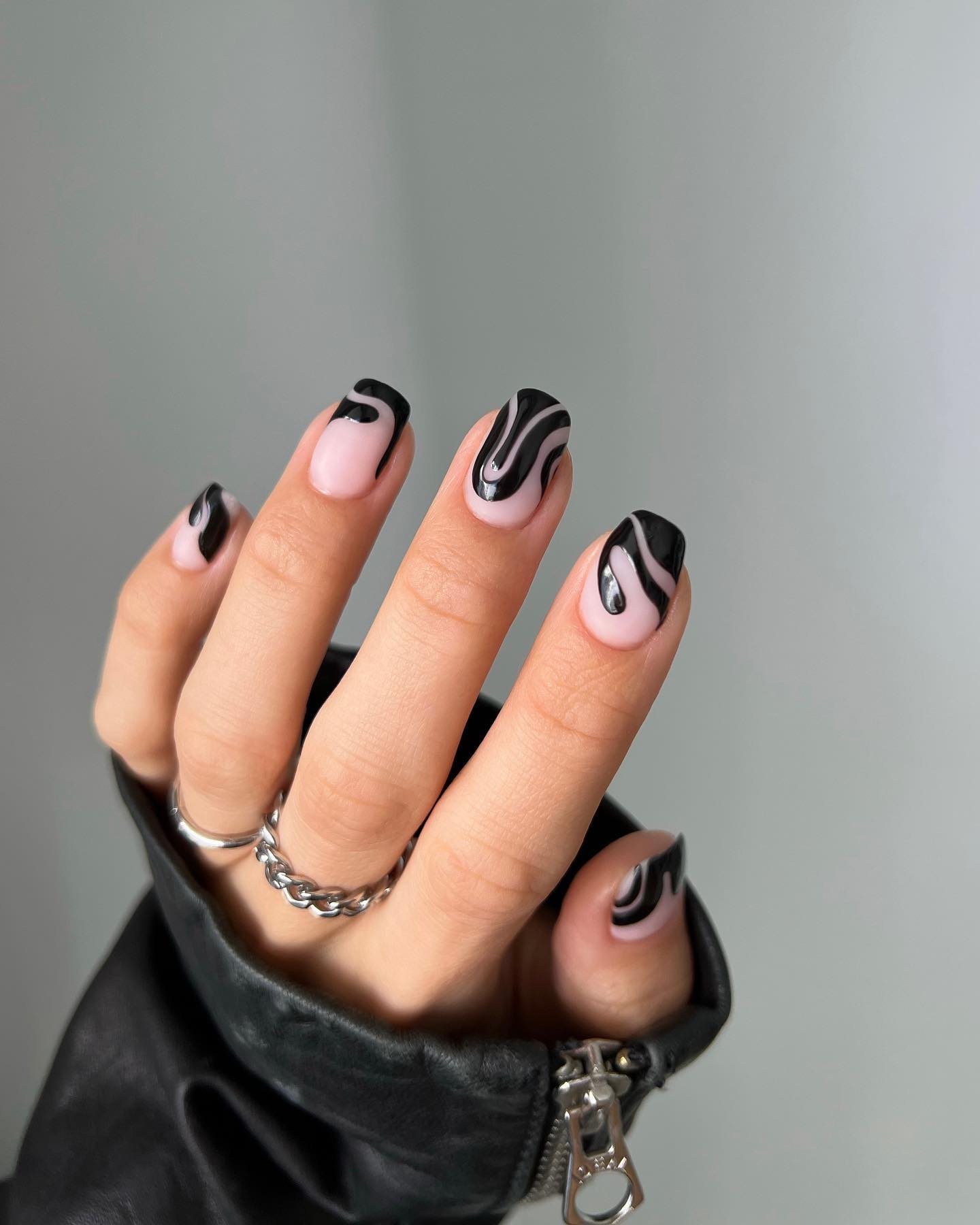 Glossy Black Swirl French Tips on Nude
