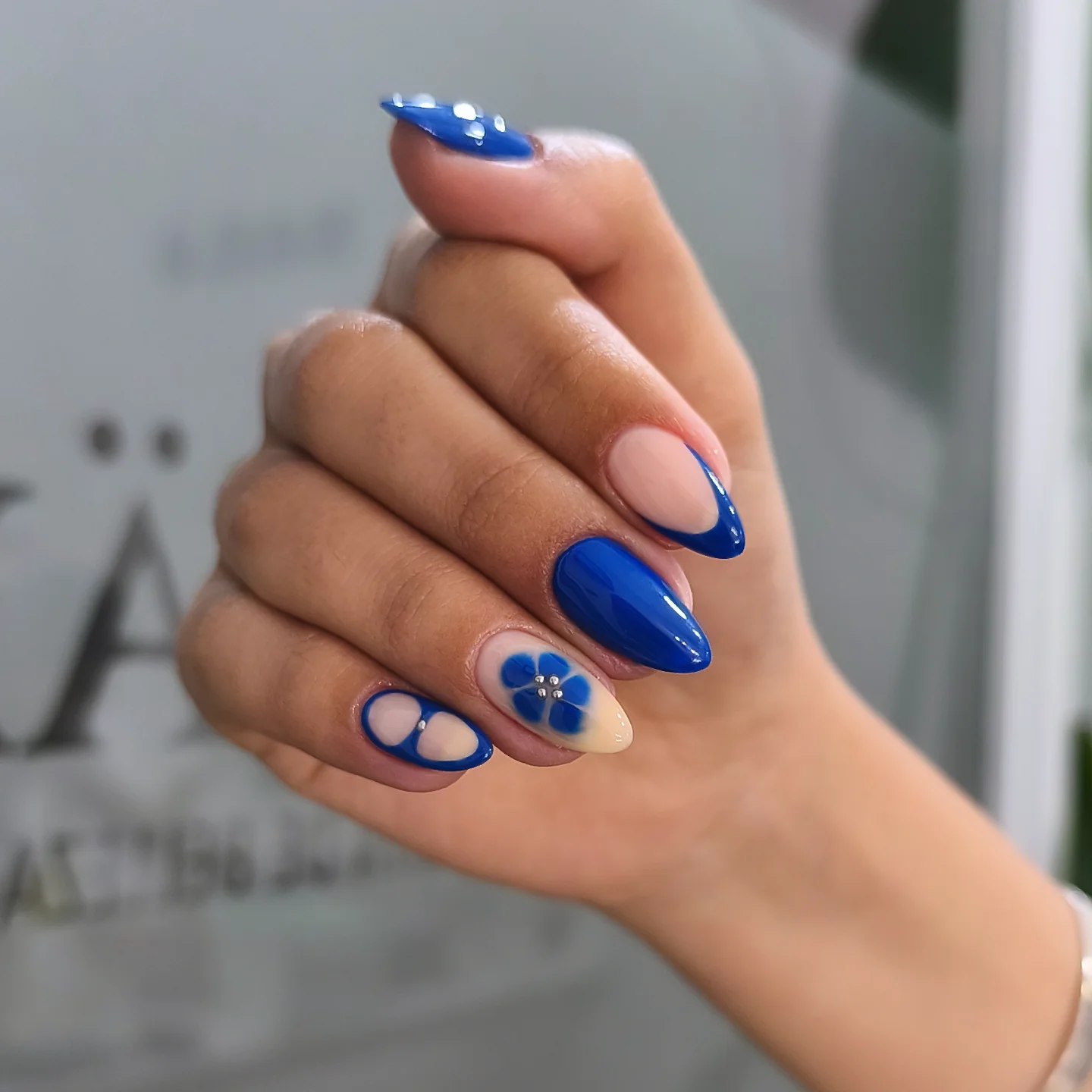 Glossy Cobalt Blue Floral Almond Manicure