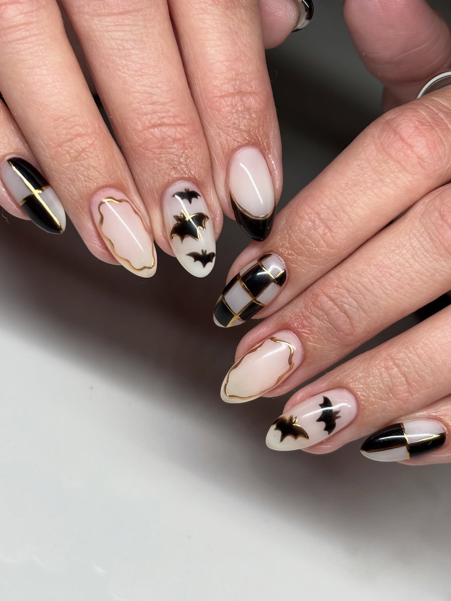 Gothic Bat and Checkerboard Gold Outline Nails