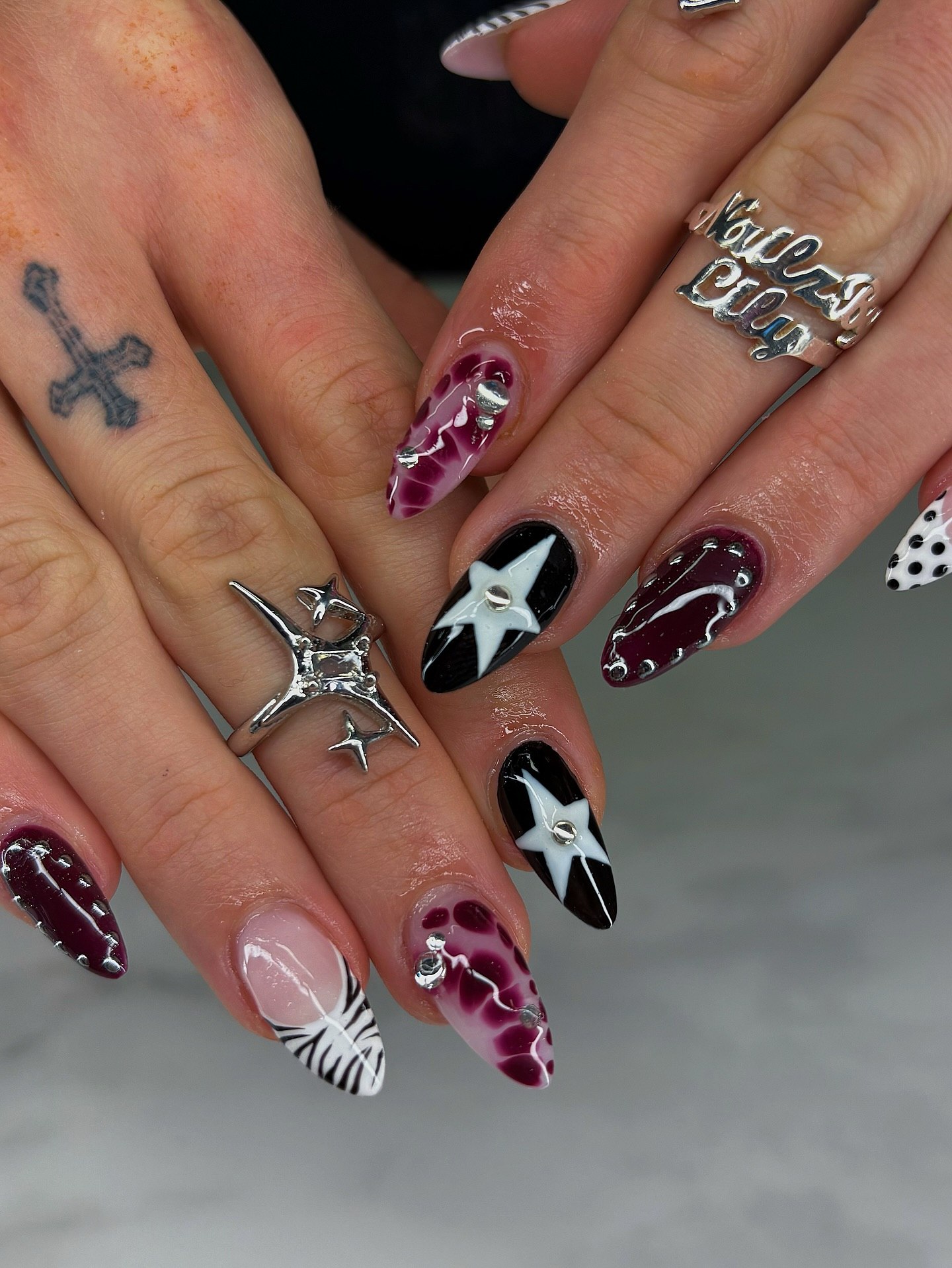 Gothic Glam Star and Swirl Almond Nails