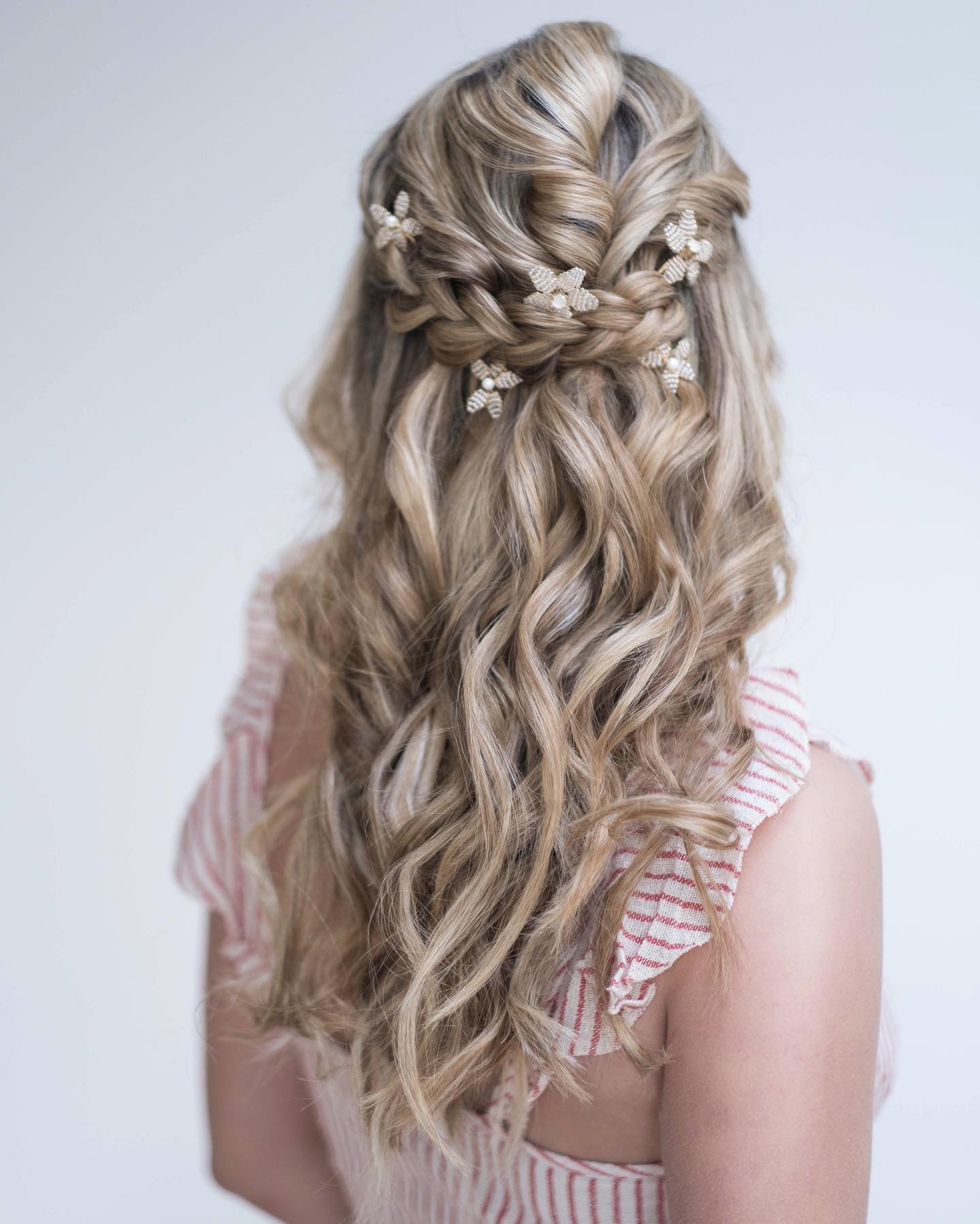 Half Up Braided Style With Floral Accents