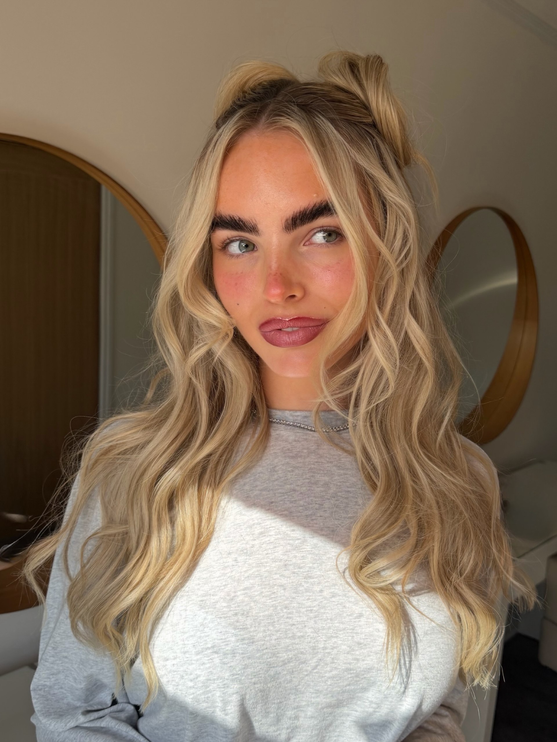 Half Up Space Buns On Wavy Honey Blonde