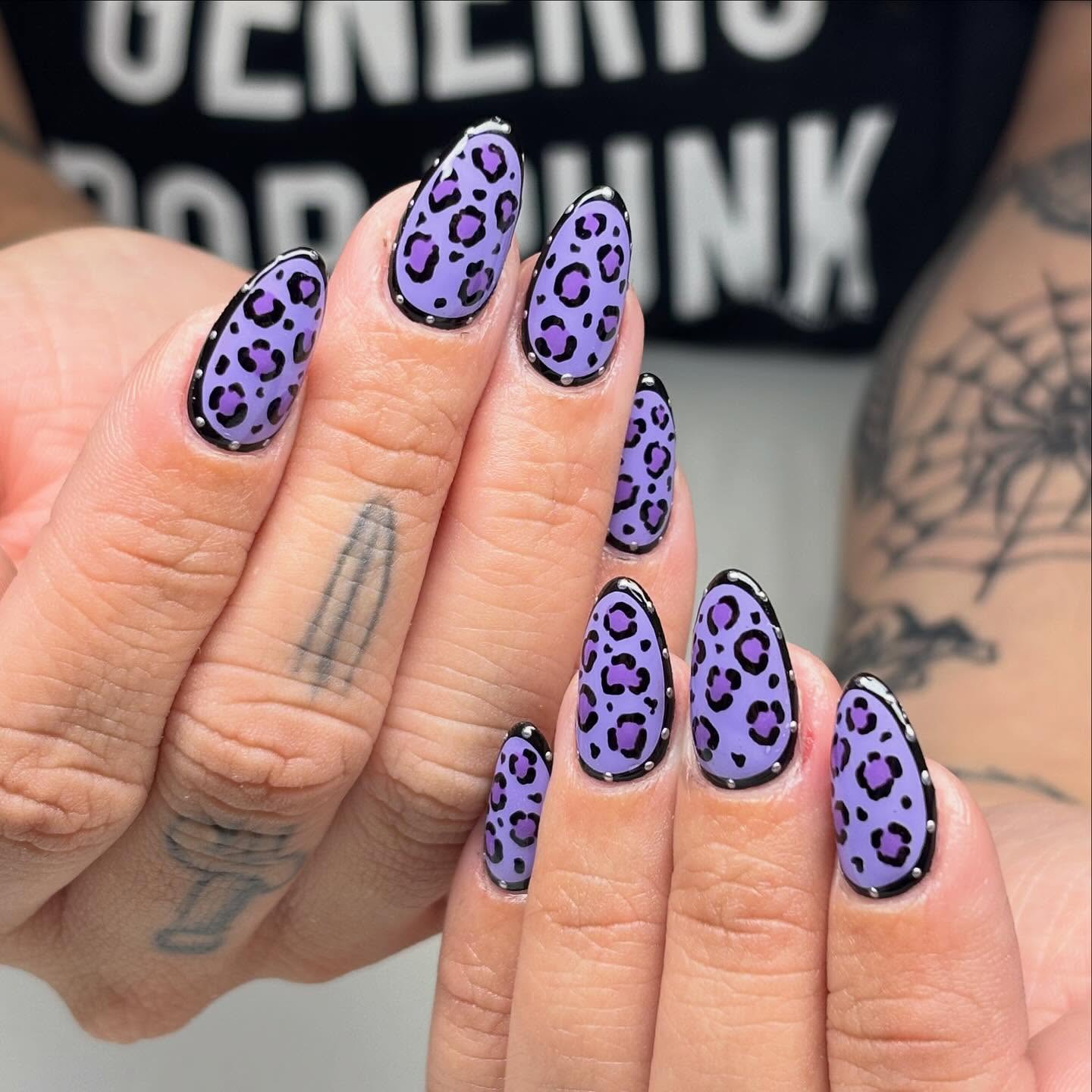 Lavender Leopard Print Almond Nails with Black Outline